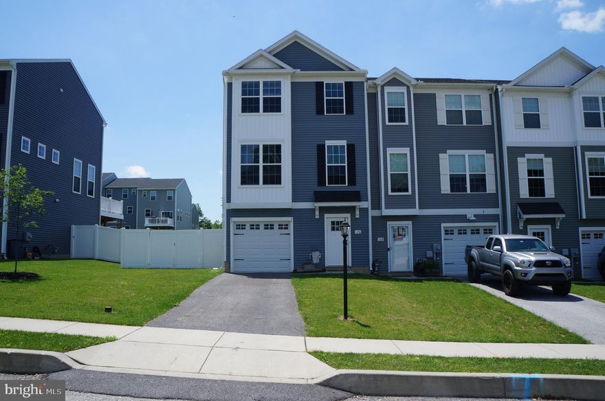 This beautiful home built in 2019, with features including 3-bedrooms (4th bedroom optional in lower level), 2.5-bathrooms that combine modern living with comfort and convenience. Located in South Western School District, this home offers an inviting open floor plan, central air, and an array of amenities that make it a perfect fit for families and professionals alike.

Enjoy a bright and airy open floor plan that seamlessly connects the living room, dining area, and kitchen, perfect for entertaining guests or spending quality time with family. The kitchen comes fully equipped with all appliances, including a refrigerator, stove, dishwasher, and microwave, making meal preparation a breeze.  The lower level, currently used as an office, offers potential for a fourth bedroom or can be used as a home office, gym, or playroom.  Two full bathrooms and one half bathroom are thoughtfully designed and well-appointed with modern fixtures. Washer and dryer are included, making laundry day easy and efficient.

Outdoor Living: Step outside to a beautiful low maintenance deck overlooking a large, fenced-in backyard, ideal for outdoor dining, gardening, or simply unwinding. This end unit townhouse offers extra privacy and a serene setting. The large fenced-in backyard is perfect for children, pets, and outdoor activities.  Centrally located to offer easy access to schools, parks, shopping, and dining options, all within a short distance.

Don't miss out on this opportunity to own a beautiful townhouse that combines comfort, style, and convenience. Schedule a showing today and experience all this wonderful home has to offer!