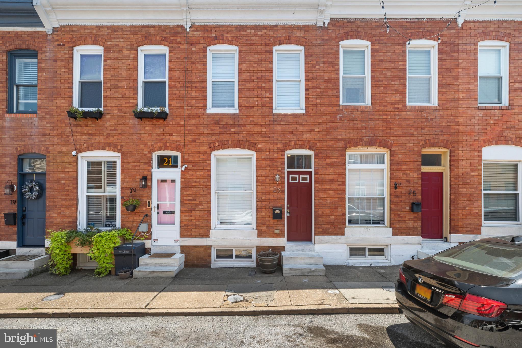 Welcome to 23 S Decker Ave – Where Style Meets Convenience in the Heart of Patterson Park!
This beautifully updated 3-bedroom, 3.5-bath rowhome offers over 1,000 square feet of thoughtfully designed living space, perfectly blending modern finishes with classic Baltimore charm.
Step inside to an open-concept main level featuring gleaming hardwood floors and a gourmet kitchen complete with custom cherry cabinetry, granite countertops, stainless steel appliances, and ceramic tile flooring.
Upstairs, you'll find two spacious bedrooms and two full bathrooms, including a luxurious primary suite with a private bath. The fully finished lower level includes a third bedroom, another full bath, a versatile rec room, and a separate laundry area — ideal for guests, roommates, or a home office setup.
Enjoy outdoor relaxation in the landscaped rear yard, perfect for entertaining or creating your own urban garden.
Located just steps from Patterson Park and minutes from Canton, Fells Point, and Johns Hopkins, this move-in-ready gem offers exceptional space, updates, and location.
Don’t miss your chance to own a turnkey home in one of Baltimore’s most vibrant neighborhoods!