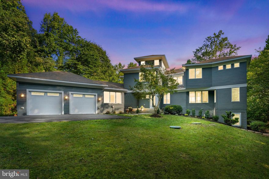 Welcome to an idyllic haven, a luxurious retreat nestled along the stunning Potomac Creek, occupying 11.49 acres of natural beauty. This expansive estate boasts 6 bedrooms, 4.5 bathrooms, and 6,313 square feet of refined living space. Offering breathtaking views and just 15 minutes from downtown Fredericksburg, this home allows you to immerse yourself in nature while maintaining accessibility. Almost every window frames Crow's Nest Natural Area Preserve, home to nesting bald eagles and various other bird species. Inside, discover elegantly designed interiors, a recently renovated kitchen, 6 tranquil bedrooms, and two luxurious primary suites, one on the main level. The first floor features a theater room, billiards and a guest suite with its own kitchen and private entrance. Outdoors relish in multiple terraces, fireplaces, marshlands leading to the water's edge, and access to activities like boating, fishing, and kayaking. Additionally, plans and conditional HOA approval for a pier and dock are in hand, which gives you direct Potomac Creek access from the property. Positioned in Potomac Creek Estates, this property marries seclusion with convenience, offering a quintessential lifestyle blending luxury, natural allure, and the utmost privacy.