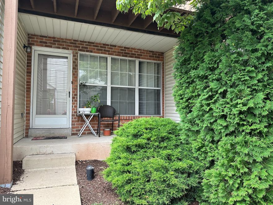 We have received multiple offers on this property.  Best and finals are due by Wednesday, 8/16 at 6:00 with a response date of Thursday 8/17.  Move-in ready 2-bed, 1-bath 1st floor condominium with full finished basement. Enjoy this open concept of this very well maintained and updated living space in a great location. This home features hardwood flooring on the entire first level, updated kitchen with upgraded cabinetry, granite counters, stainless steel appliances and a pantry.  The main bedroom has a walk-in closet with custom built-ins and a sliding glass door leading to the new back deck where you can enjoy your morning coffee overlooking the well manicured community.  The full bathroom has been updated  with full tile tub/shower surround.  And for more space the basement has been fully finished and also has a laundry area as well as ample storage for your convenience.    Enjoy the amenities of the neighborhood including an in-ground pool and community club house and tennis courts!   All this plus a prime location close to shops and parks. Don't miss out on this opportunity! The Seller has been told that a $6,000 special assessment may be placed on the property in November to replace the roof