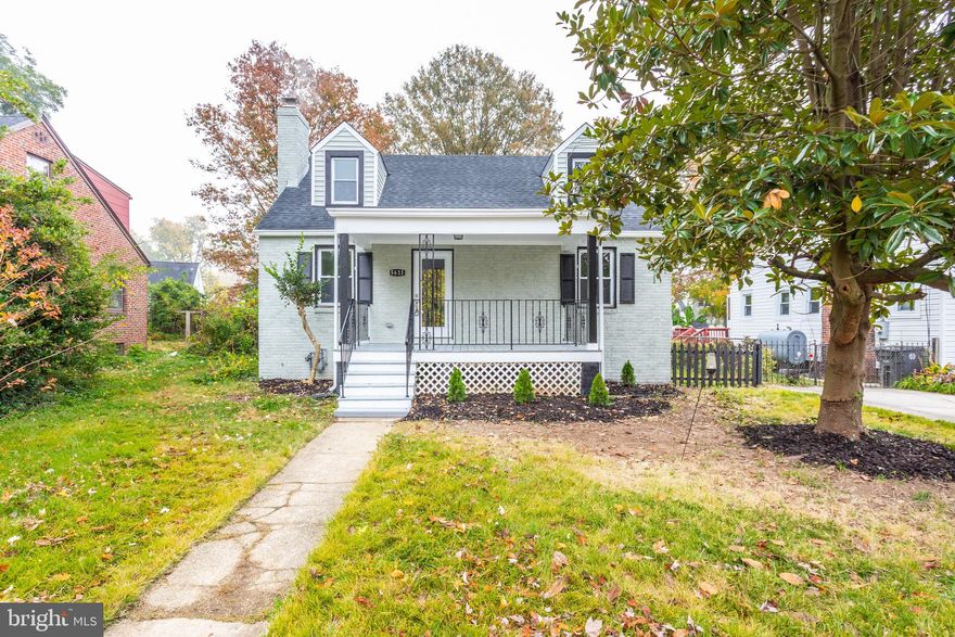 Charming, updated 3 level Cape Cod-style home in Hyattsville's Castle Manor neighborhood. This gorgeous gem features 4 bedrooms, 3 baths with a lovely front porch. brick exterior, and parking! From the moment you enter you will fall in love with the great open, modernized floor plan flow for gatherings. Upon entry, you are greeted by the bright living room with wood burning fireplace. From there, walk into the generous eat-in gourmet kitchen with breakfast bar, huge peninsula, pendent lighting, white shaker cabinets, granite counter-tops, subway tile backsplash, stainless steel appliance, and gas cooking. Off the kitchen you will find the dining area. From here step out to the to the rear deck and large backyard-perfect for barbecues. A great open, modernized floor plan flow for gatherings. 2 nice size bedrooms and a luxury full-bath with tub complete the main level. Upstairs you will find a large master suite with ensuite lavish full-bath. A generous 2nd bedroom with chic full-bath down the hall. A finished walk-up lower level with recreation area, 4th bedroom, and new carpet. The laundry room and additional storage area.  is located in the finished basement, along with a huge walk-in closet, family space, full bathroom, and additional storage space. New windows, gleaming refinished hardwood floors, recessed lighting, freshly painted, and more! Commuterâs dream-within walking distance to two metro stations and historic Hyattsville, you sit in the perfect triangle to reach Washington DC, Baltimore, and Annapolis. Welcome home!