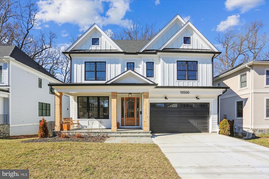 Welcome to 10500 Parkwood Drive, a spectacular newly constructed home crafted by the award-winning West Hill Builders. Meticulously designed with exceptional workmanship and the finest materials, this residence showcases unparalleled quality and attention to detail. Nestled on a beautiful lot backing to trees and park in the sought-after location of Kensington, this property offers both convenience and tranquility. 

Approaching the home, you are greeted by a flagstone walkway leading to a central portico, boasting an inviting front porch adorned with 12" solid cedar columns, overlooking the meticulously manicured front lawn. Stepping through the solid wood and glass front door, you are immediately captivated by the grandeur of the floor plan, spanning over 5,300 square feet.

The interior of this home boasts stunning features such as fabulous stained oak flooring, extensive millwork, and 9 + foot ceilings on each level. The craftsmanship is evident as you enter the exquisite foyer, with its striking grand staircase, private office to the right, and formal living room across the way. The living room seamlessly flows into a banquet-sized formal dining room adorned with a designer chandelier, creating an ideal space for entertaining.

The butler's pantry connects the dining room to the kitchen, providing the option for open-concept entertaining or a more intimate atmosphere. The kitchen itself is a chef's dream, featuring stunning contrasting cabinets, marble countertops, and top-of-the-line appliances from Jenn Air, including a 48" range, 48” custom refrigerator, and high-velocity exhaust hood. Adjacent to the kitchen is the family room, complete with a natural gas fireplace, custom millwork and expansive windows offering views of the verdant backyard. Direct outdoor access to the deck and yard further enhances the seamless flow between indoor and outdoor living spaces. Completing the main level is a powder room and a spacious mudroom area with custom built in cubbies and access to the two-car garage.

Ascending the grand staircase, you reach the upper level's central vestibule, which leads to a wide landing area. The primary suite is a sanctuary of space and luxury, featuring two large walk-in closets and a lavish bath. The bath offers a multitude of amenities, including a freestanding soaking tub, a multi-jetted shower, and heated floors in the exquisite wet room. Three additional generously sized bedrooms on the upper level each boast high ceilings and uniquely styled ensuite baths. A cozy second-story family room provides a perfect space for relaxation and can also function as a seventh bedroom if desired. Completing the upper level is a convenient main laundry room.

The home also offers a fantastic third level, comprising a large bedroom, a full bath, wet bar and a phenomenal bonus room, adding versatility to the floor plan. The lower level presents a spacious recreation room and storage rooms that can be tailored to suit your needs. It is perfect for entertaining, featuring a dry bar, combination wine/beverage center, a mirror-walled fitness center, a spacious bedroom, and a full bath. Stepping outside, the rear deck provides a serene retreat overlooking the lush trees.

This remarkable home is built to last, with features such as Hardie siding, a 50-year roof, Andersen windows, standing seam metal roof, oversized gutters, and even a Tesla/EV rough-in. It also includes a whole-house sprinkler system for added peace of mind. Ideally located just off Beach Drive, where no cars are allowed to drive on Saturday and Sunday, minutes away from downtown Kensington and Bethesda, and within close proximity to the Beltway, major airports, and Washington DC, this residence falls within the coveted Walter Johnson school district and offers easy access to all amenities.

With its stunning aesthetics, impeccable craftsmanship, and unbeatable location, 10500 Parkwood Drive is the epitome of the perfect place to call home.