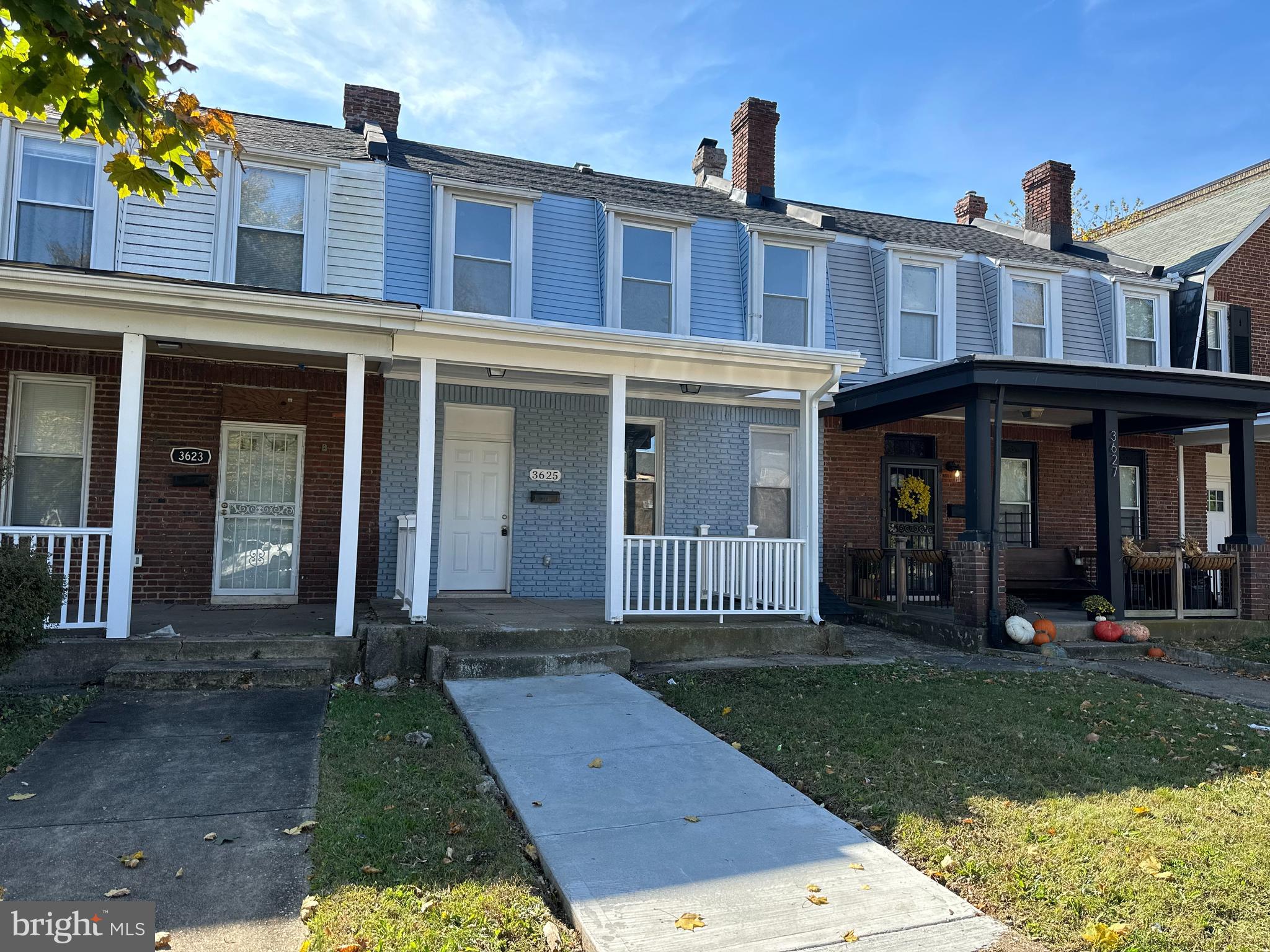 This beautifully remodeled 4-bedroom, 3.5-bath home offers modern living in a prime Baltimore location. Step inside to find a bright, open-concept floor plan with luxury flooring throughout. The spacious living room flows into the dining area and a stunning kitchen featuring stainless steel appliances, sleek quartz countertops, and a large island with seating. The main level also includes a convenient laundry room off the mudroom and a half bath. Upstairs, the master suite includes a private en-suite bath, while two additional bedrooms share a beautifully tiled full bath. The fully finished lower level offers flexible space that can be used as a fourth bedroom or a family room, plus another full bath with a walk-in shower. Outside, enjoy a newly constructed rear deck overlooking the spacious yard, offering plenty of room for relaxation or entertaining. Additional parking for up to 6 cars in the rear plus ample street parking. This home is move-in ready and located close to shopping, universities, and major commuter routes. Don't miss this opportunity!