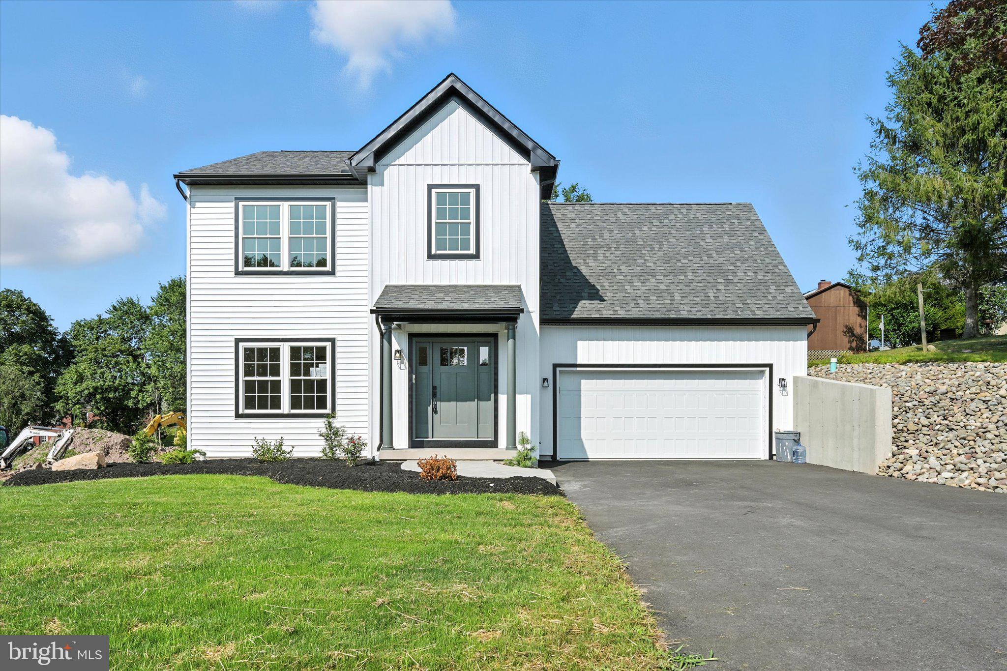 Dreaming of a new construction home without the stress of building?
Welcome to your dream home—freshly finished and perfectly placed in the quaint and quiet village of Hometown. This modern farmhouse was built with care and attention to detail, designed to offer all the charm of new construction without the usual hassles.
From the moment you arrive, the incredible curb appeal sets the tone. A curved walkway, lined with fresh landscaping, leads you to a stunning exterior featuring board and batten siding accented by sleek black trim. The sage-green Craftsman-style front door invites you into a warm and welcoming foyer, where 9-foot ceilings and custom stair railings create an immediate sense of space and style.
The spacious eat-in kitchen is a true showstopper—complete with quartz countertops, a walk-in pantry, tile backsplash, and island seating, it’s the perfect place for everyday meals or large gatherings. An available gas range hookup finishes off this beautiful kitchen. A designer powder room on the main level adds a touch of luxury with a stylish tile accent wall and premium finishes.
Upstairs, you'll find three generously sized bedrooms, each with walk-in closets, plus a convenient laundry room and hall bath. The primary suite is a retreat of its own, featuring a luxurious en suite bath with dual vanities and a beautifully tiled walk-in shower.
Step outside to enjoy the large, private yard, offering endless possibilities for entertaining, gardening, or simply relaxing under the open sky.
This one is truly move-in ready—modern farmhouse charm, top-notch finishes, and no construction delays.
Don't miss your chance—schedule your private showing today!