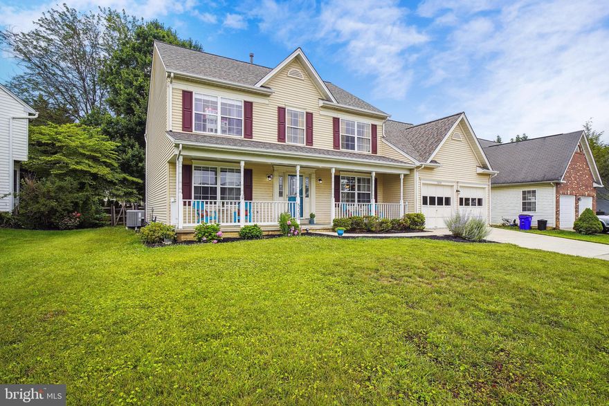 Beautifully maintained classic colonial with usable front porch in Kingsbrook! Inviting main level foyer features designer accents and hardwood flooring , powder room, light filled office, spacious formal living room, separate formal dining room with wainscoting and a lovely comfortable family room which boasts a wood burning fireplace. built in bookshelves and sliding glass door to lovely rear deck and a fenced back yard. Light filled table space kitchen features a center island with Corian countertops, stainless steel appliances, The primary suite on the upper-level boats, three closets two of which are walk-ins and a lovely on suite full bath Three additional very spacious bedrooms with ample closet space on the upper level with full hallway bath and linen closet. All of these spacious secondary bedrooms feature overhead lighting/ceiling fan fixtures and loads of closet space. Finished lower level with another family room and a full bath, storage/utility room and recessed lighting throughout. Sliding glass door to exterior walk up to the fenced rear yard. Relax on the front porch or on your rear deck. This lovely home is move in ready. Plenty of parking in the garage and driveway. Roof is less than 3 years old HVAC less than 4 years. Minutes to I270, Mom's Organic Market, shops and restaurants. Please check out the TruPlace interactive floor plan. Offers due by Monday July 3rd @ 12: noon