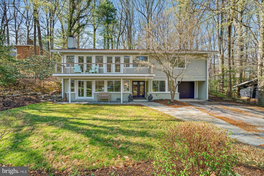 Nestled in the heart of Bethesda's sought-after Carderock Springs community, 8404 Peck Place offers a harmonious blend of classic charm and contemporary upgrades. Entering the home you will find a gracious foyer with two rooms, the first of which is currently used as a study but could double as a guest room as it has an adjacent remodeled full bathroom. Across the hall is a generously sized bonus room with a fireplace and large picture windows which allow for tons of natural light. Ascend the stairs to the bright and airy main level featuring a thoughtfully remodeled kitchen, designed to cater to both culinary enthusiasts and entertainers alike. Featuring state-of-the-art appliances, custom cabinetry, and elegant countertops, the kitchen seamlessly integrates with the open living spaces, creating an inviting atmosphere for gatherings. Large windows and skylights ensure the area is bathed in natural light, enhancing the warm and welcoming ambiance. The living room and dining rooms seamlessly lead you out to the back deck and yard. Beyond the kitchen you have another living area that features yet another outdoor deck. Down the hall you have two more guest rooms, a hall bathroom and the primary bedroom with a newly remodeled ensuite bath featuring a dual vanity, spearat glass enclosed stall sowing and a oversized soaking tub. Experience the truly perfect fusion of style and functionality in this exquisite residence. And don't forget all that the Carderock Springs community has to offer, including the Clubhouse, Tennis and Pickleball Courts, Pool, and A Playground. Close to the C&O Canal trail, Cabin John, Glen Echo Park and Great Falls. First Open House Sunday April, 6 from 12-3PM.