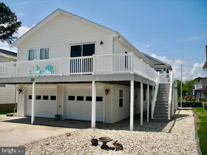 ATTENTION MULTIPLE OFFERS RECEIVED HIGHEST AND BEST OFFER  BY  6:00 pm  ON 09/13/2022!  Gorgeous 4 br 3 bath waterfront on the Saint Martin River with fantastic view of bay and canal. This home was loved and cared for by only 2 owners. Many improvements most recent in 2020 updated kitchen, stainless steel appliances, granite tops, new vinyl plank flooring, recess lighting, carpet, updated bathrooms and freshly drywalled and painted. 2 car garage, elevator, gas fireplace, master bath, screen in porch, front porch, wrap around deck, maintenance free exterior, outside shower are just some of the  features this home offers. This home is being  offered fully furnished and ready for fun in the sun waterfront living.