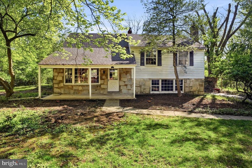Come preview 662 Deaver Drive, located in a desirable Whitpain Township community within the highly sought-after Wissahickon School District. This is a rare opportunity to own a home in this lovely neighborhood. While the property requires updating, it offers tremendous possibilities for its new owner to create the home of their dreams. , an eat-in kitchen, and an abundance of natural light from multiple windows, including two bay windows.  A charming covered front porch welcomes you and sets the stage as you enter. The home features 5 bedrooms, 3 full bathrooms, and a half bath, offering ample space for comfortable living.  The main level includes a spacious living and dining room combination
Ascending to the second level, you’ll find the primary bedroom with an en-suite bathroom, two additional generously sized bedrooms with ample closet space, and a full hall bathroom.  The third level offers two oversized bedrooms, a full bathroom, and a walk-in attic. This versatile space is ideal for guests, a home office, or extended family living. Hardwood floors run throughout the main, second, and third levels, creating a cohesive look and enhancing the home’s sense of space.  The lower level showcases a massive family room featuring a wood-burning stove flanked by built-in bookshelves and a striking stone façade. This level also includes a laundry/utility room, a half bathroom, and convenient access to the driveway.  Bring your imagination, creativity, and inspiration—this home offers endless potential to become your dream home.