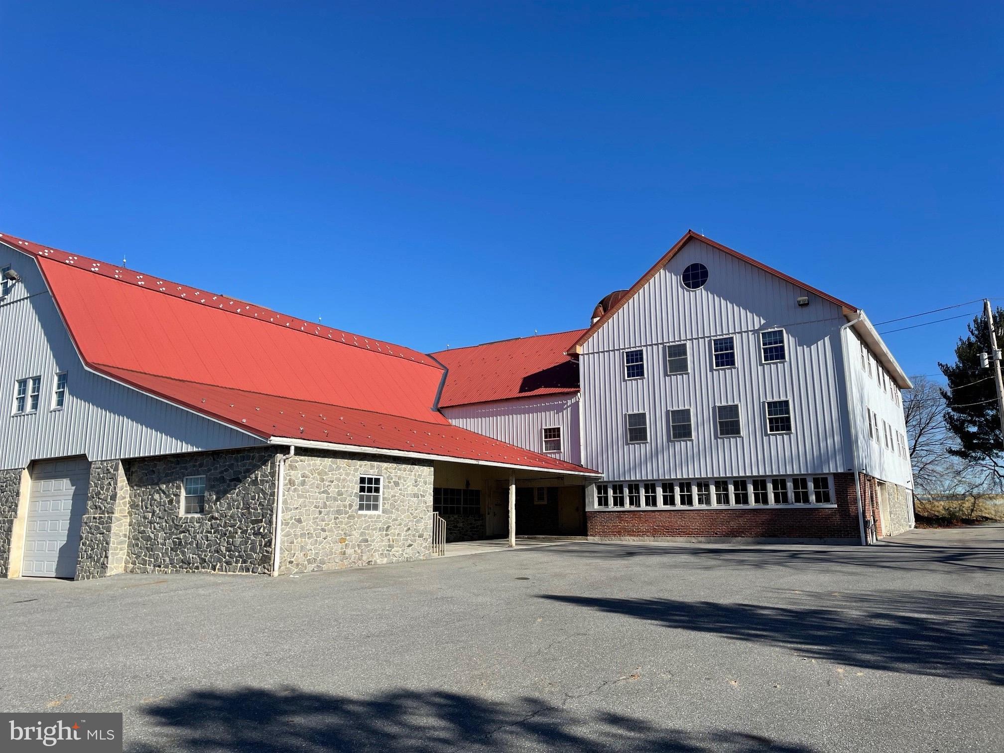 East Hempfield prime location just off Rt. 283 and State Road ! Enterprise zoned Mixed use is a contractors paradise! 3- Phase electric.
Beautiful restored barn customized into 6,100 S/F 2nd and 3rd floor office and 7,800 S/F ground floor Shop, loading dock area with 83’ deep garage. Two 13’x12’ automated rollup doors.
Lots of value in all the private macadam area for cars, trucks, equipment, staging area and outside storage!
Zoning by right permits agriculture wholesale operations, Motor vehicle storage/sales and leasing, Horticultural operations, Auction/automobile, Auction/wholesale, Heavy equipment sales, service and repair, General Industrial, R&D technical offices, office/wholesale operations. A must see to appreciate all the possibilities this site has to offer.