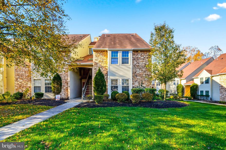 Welcome to Tavistock! This main-floor condo offers an easy, open layout with 2 spacious bedrooms and 2 full baths. The kitchen flows to the dining area and a comfortable living room featuring a fireplace. French doors open to your private balcony with a serene, tree-lined view—perfect for morning coffee or evening wind-down. Enjoy resort-style amenities including a pool, clubhouse, fitness center, and tennis courts. All of this in a prime location within walking distance to downtown Haddonfield, with easy access to Rt. 295 and the PATCO High-Speed Line for effortless commuting.