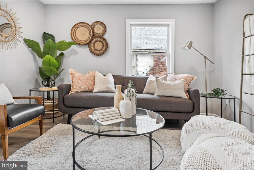 Welcome Home! Updated single family home in Anne Arundel County in sought after Orchard Beach! Boasting an array of sleek finishes, this 3-bedroom 2-bathroom Cape Cod has the space you need to create the life you desire! Walk into your living room, dining room and open gourmet kitchen with new cabinets, quartz countertops, and stainless steel appliances. Main level also has 2 bedrooms and a renovated hallway bathroom. Upstairs includes a large master suite with a renovated bathroom and new carpet.  Downstairs experience a large full unfinished basement great for storage or a man cave. Off street parking and a nice sized backyard with a huge deck that is perfect for entertaining.  This tranquil home is nestled in a quiet and exclusive water oriented community. Schedule your showing before this one is gone!