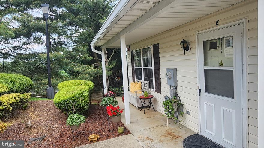 Living is easy in Marvin Gardens! This move-in ready 55+ condo w 2BRs/2BAs has an open floorplan with an updated kitchen with stainless steel appliances and granite countertops. The flooring in kitchen, living room and hallway is hardwood, which makes for easy transitions to the carpeted bedrooms. Two full baths - one with soaking tub, one walk-in shower, and washer and dryer in unit. Primary bedroom is roomy and has its own walk-in closet. Enjoy the extra natural light you’ll get in this end-unit! One assigned parking spot. Private separate storage area on lower level. Close to restaurants and shopping. Enjoy regular monthly activities in the senior hall!