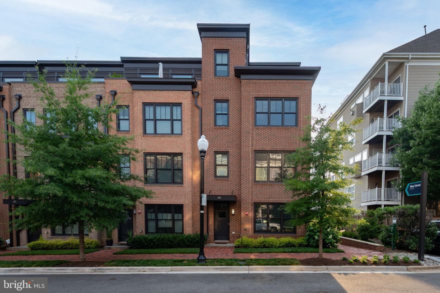 URBAN MEETS TRADITIONAL IN OLD TOWN ALEXANDRIA!  Built in 2016 - Amazing contemporary townhome at Majesty West is filled with modern finishes and features.  State-of-the-art gourmet kitchen with Carrera marble waterfall island, open concept living room/dining room/kitchen, gorgeous primary bath with walk-in glass shower, stunning 5" dark wood floors, fourth-floor loft/family room, two roof-top terraces, entry level guest room, 2-car garage and so much more!  Marble, glass tile, nickel door hardware and faucets complement the sleek style.  End-unit home with tons of windows provide natural light from the front (east), side (north) and rear (west), and a beautiful open view.  Always been intrigued by the idea of living within walking distance of everything Old Town has to offer - but not excited about a historic home - then this is the one for you!  Walk to King Street Metro, shops and restaurants.  Enjoy a leisurely stroll  to the river with your dog!  Live Facebook tours and public open houses Saturday and Sunday, June 19 and 20.  Hope to see you then!
