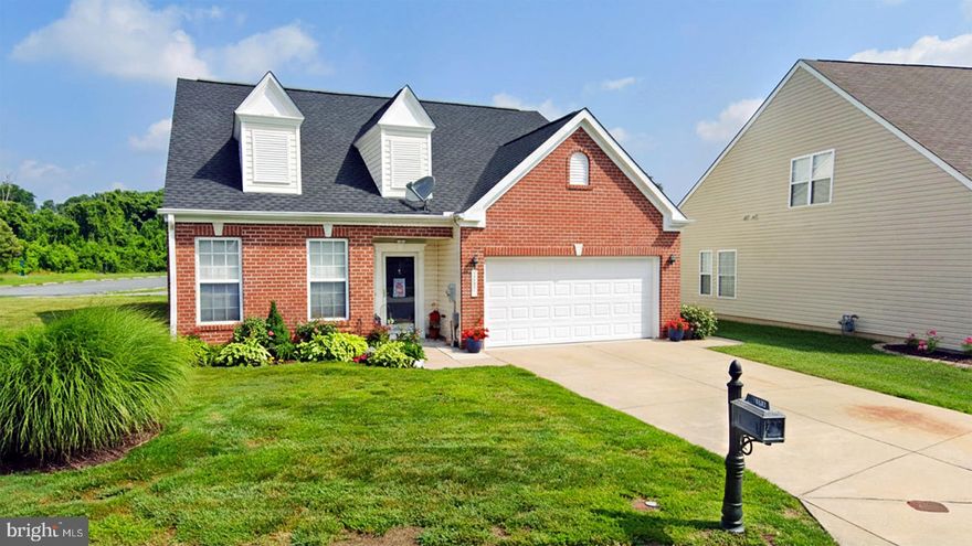 Welcome to this beautifully maintained single-level home in the desirable Wood Creek Golf Community in Delmar! Offering 3 spacious bedrooms and 2 well-appointed bathrooms, this home combines comfort, style, and convenience in a sought-after neighborhood. Step inside this single level home to a bright and airy living room featuring a stunning vaulted ceiling that enhances the open feel of the home. The main living areas are finished with durable and stylish luxury vinyl plank flooring, providing both elegance and easy maintenance. A charming sunroom filled with ample windows offers the perfect space to relax, entertain, or enjoy peaceful backyard views year-round. The living areas flow seamlessly to a fenced patio complete with a retractable awning — ideal for outdoor dining or enjoying warm summer evenings in comfort and shade. Additional highlights include a new roof installed in 2022 and a garage equipped with its own mini-split heat and A/C system — perfect for hobbies, projects, or additional climate-controlled space. Residents of Wood Creek enjoy access to a community pool and beautifully maintained surroundings, all while being conveniently located near local parks, shopping, dining, and offering easy access to Salisbury for commuting or entertainment.