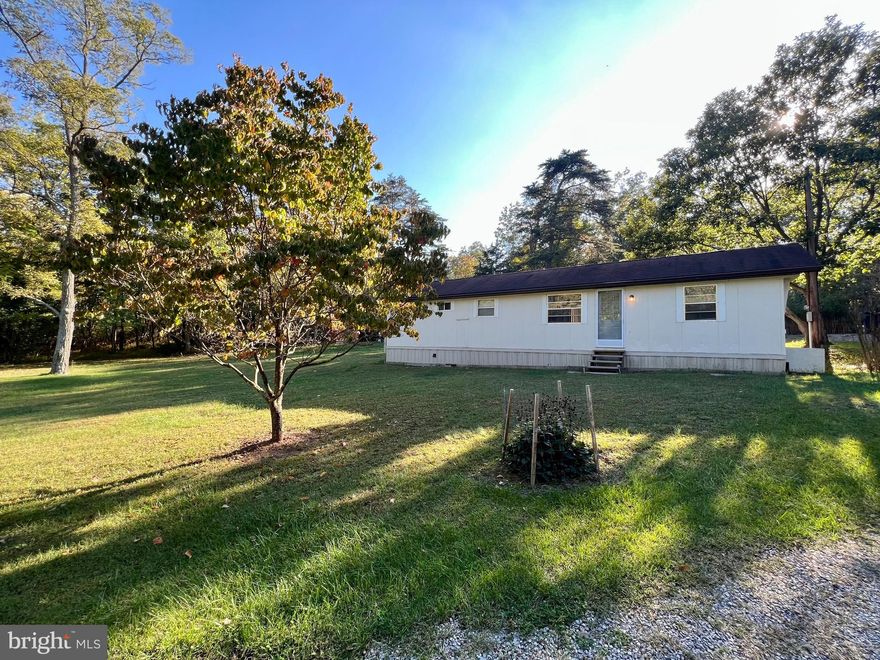 This single-wide manufactured home is located on a large treed lot in Great Cacapon and features: 2 bedrooms, 1 full bathroom, open concept living/dining room, kitchen, washer and dryer on-site, and spacious exterior car port.

Located just a short drive off of Rt 9 West, this home is split between I-81 and RT 522 to get to I-68.

Rent includes Renter's Insurance.

Pets are Case by Case (35lbs and under allowed).

EHO.