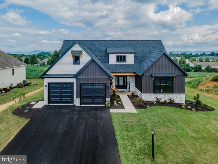 QUALITY and details that are second to none in this BRAND NEW Musserbuilt model home!   The kitchen, dining and great room combine for that "open concept" feeling in this Craftsman style masterpiece. The main floor primary suite includes private entry, large walk-in closet, curbless tile shower, double vanity and direct access to spacious laundry room with utility sink and cabinetry for storage.  The home office can serve many purposes and provides stylish space for those who work from home.   The fabulous kitchen with stainless appliances includes an island with quartz countertops that provides seating for 5 and is perfect for hosting neighborhood happy hours!  Additional features include solid-core Craftsman style interior doors, Melamine custom closet organization systems, distressed hickory hardwood, custom cabinetry of solid wood construction with soft close doors, and quartz countertops throughout.   Mudroom off garage with built-in bench and storage cubbies.....AND the garage is large enough to actually park two cars (or trucks) in it!  Musser  Home Builders consistently achieves energy results that exceed the building code by 45%.  (A copy of energy test results will be provided.)