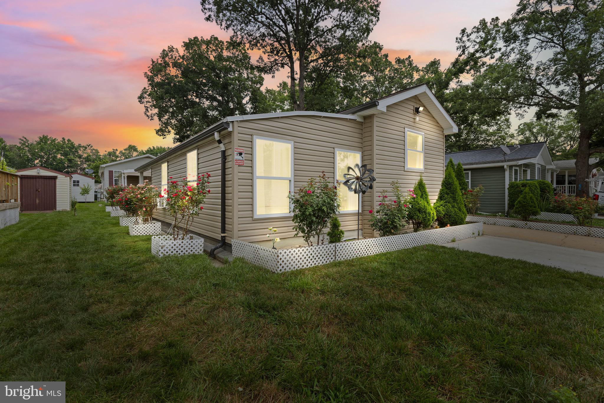 Welcome to 3512 Wagon Train Rd where comfort, style, and pride of ownership meet! Located in the well-maintained Williams Estates community, this beautifully updated manufactured home offers 3 spacious bedrooms, 2.5 bathrooms, and a thoughtful floor plan designed for easy living and entertaining.
From the moment you arrive, you’ll feel the warmth and care the current owners have poured into every corner of this home. Step inside to discover a bright and open living area filled with natural light, leading into a modern kitchen complete with upgraded cabinetry, ample counter space, and a cozy breakfast area. Each bedroom is generously sized, with the primary suite featuring a private full bath and walk-in closet. The additional bedrooms are perfect for guests, a home office, or growing families, and the 2.5 bathrooms offer comfort and convenience for all.
One of the standout features of this home is the beautiful outdoor space, perfect for relaxing, entertaining, or simply enjoying the peaceful surroundings. Step out back onto a spacious deck, ideal for summer cookouts, morning coffee, or evening conversations under the stars. The deck flows into a private fenced backyard—a rare find in the community offering space for gardening, pets, or even a small fire-pit area. Whether you're hosting friends or enjoying a quiet moment of reflection, the outdoor space offers versatility and charm that make this home truly special.
The owners have taken great pride in maintaining and improving this property over the years. From fresh paint and updated fixtures to carefully selected landscaping touches, you’ll feel the love and attention that has gone into making this house a true home. This isn’t just a place to live it’s a place to grow, relax, and enjoy every moment.
3512 Wagon Train Rd is located just minutes from I-95, Route 40, and White Marsh Mall, offering easy access to shops, restaurants, and major commuter routes. The Williams Estates community is known for its quiet, well-kept streets and strong sense of community. Ground rent includes community amenities, maintenance of common areas, and peace of mind knowing you're in a well-managed neighborhood.
If you're looking for a move-in ready home that offers space, value, and outdoor charm—this is it. With its spacious interior, upgraded features, and standout backyard with deck, 3512 Wagon Train Rd is ready to welcome its next proud homeowner.
Schedule your private showing today and fall in love with this gem before it’s gone!