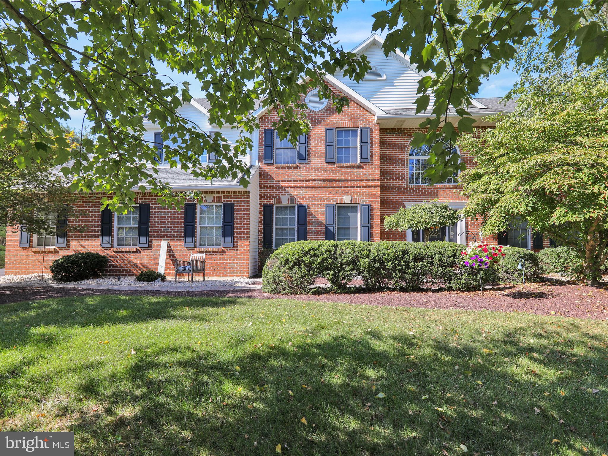 Welcome to Exeter Golf Club Estates! This stunning four-bedroom, brick two-story in Exeter Schools offers nearly 4,000 square feet of beautifully designed living space and outstanding curb appeal. Among its many highlights are dual staircases, granite countertops, crown molding, gas fireplace, expanded deck, and a paver walkway leading to the two-car side-entry garage. Step inside the impressive two-story tiled foyer with a sweeping curved staircase. The main level offers a formal living room, a formal dining room with hardwood floor and a tray ceiling, and an absolutely gorgeous kitchen featuring granite counters, center island, custom cabinetry, and a breakfast area with access to the rear deck. Just off the breakfast area, you’ll find the family room with Brazilian hardwood flooring, gas fireplace, and the second staircase to the upper level. A private office, convenient half bath, and laundry room with cabinets and sink complete the first floor. Upstairs, the primary suite is a true retreat with a vaulted ceiling, walk-in closet, and spa-like bath with soaking tub, separate shower, and dual vanity. Three additional carpeted bedrooms share a second full bath. Two open loft areas upstairs provide striking views of the foyer and family room below. The large basement offers plenty of storage and the potential for future finished living space. Outside, the home is surrounded by mature landscaping, with a spacious, level backyard perfect for entertaining or relaxing. Located just minutes from shopping, restaurants, and major routes 422 and 562, this property is an absolute showcase home where every detail has been thoughtfully designed. Call today to schedule your private showing!