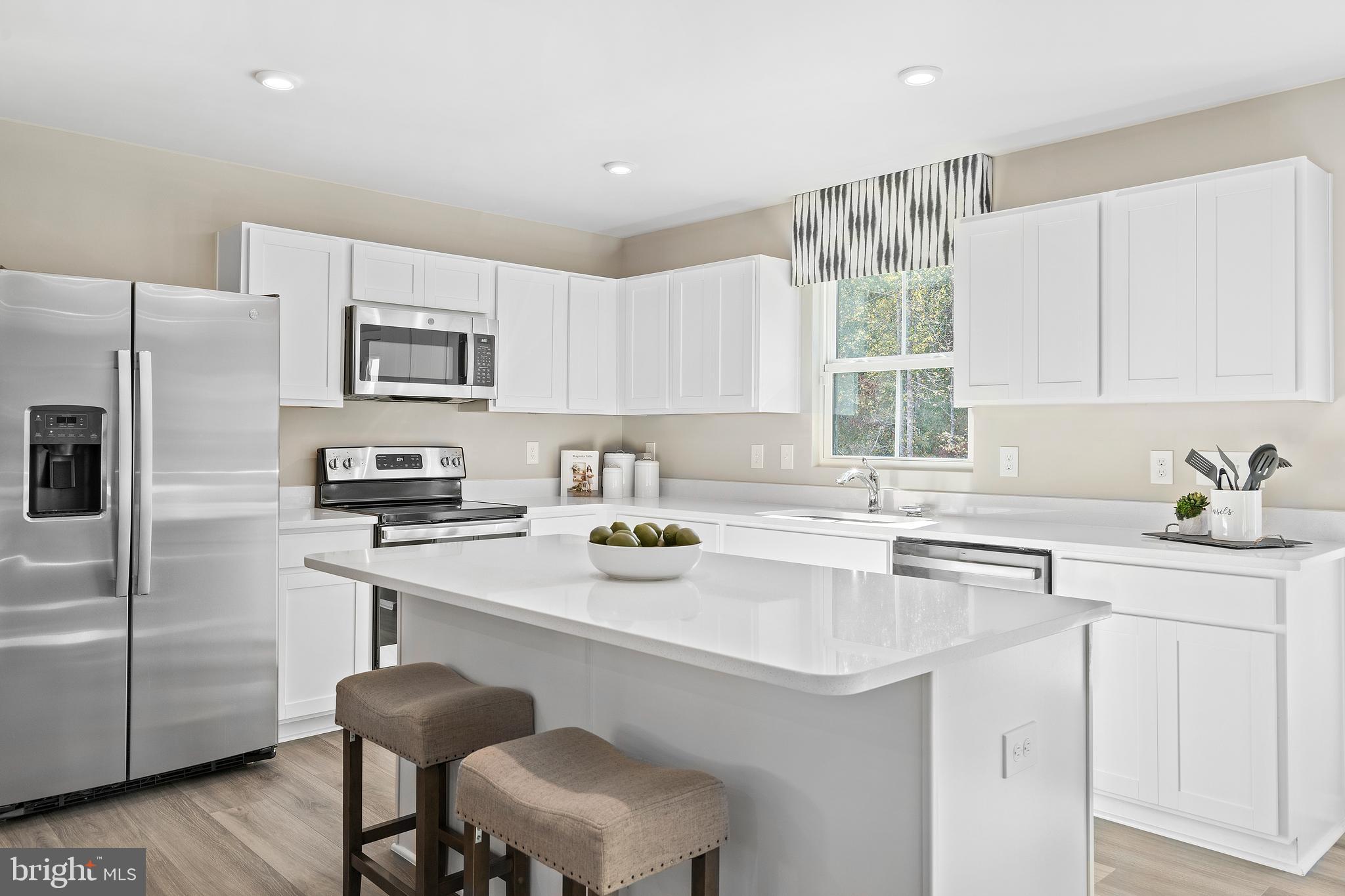 This to-be-built Cedar at the brand new OAK LEAF MEADOWS community! This home features a spacious backyard, brand new kitchen appliances and a washer and dryer, a new home warranty, and more! This 4 bedroom, 2.5 bathroom home blends function and elegance. Enter the foyer and head to the great room, which flows effortlessly into the gourmet kitchen with a spacious island, and the dining area. Beyond that, a hall leads to a powder room and flex space that can be converted into a home office, hobby room, or extra play space. Upstairs 3 of the 4 bedrooms boast walk in closets. Your laundry room is placed conveniently upstairs and includes your new washer and dryer. Your luxurious owner's suite features lots of living space, a huge walk-in closet, and a double vanity bath. A basement is optional depending on homesite. The Cedar is must-see!
Explore Oak Leaf Meadows today - Musselman school district, 5 minutes to I-81, 15 minutes to Martinsburg and 20 minutes to Winchester. Closing Assistance Available with Use of Sellers Preferred Lender! Lot premiums may apply. Other floorplans and homesites are available. Photos are representative. Come and visit the model at: 186 Inola Court, Inwood, WV 25428