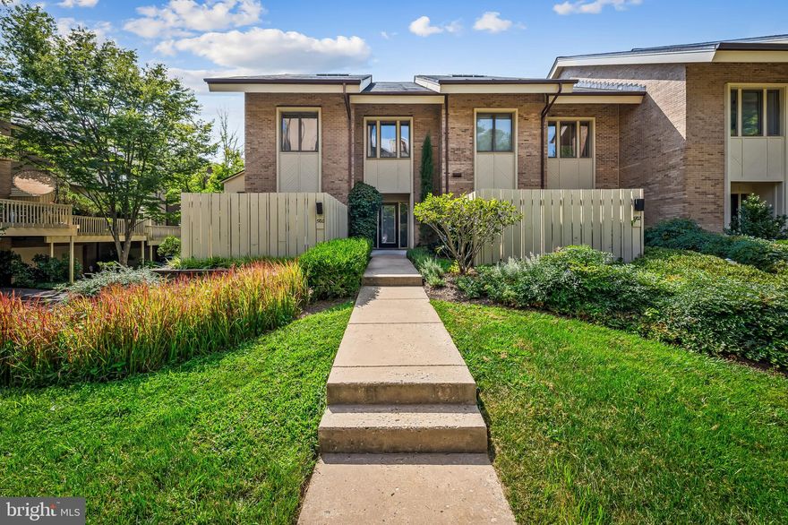 Welcome – one of the largest units in Roland Park North. This end unit which provides extra light and extra space. Every inch of this luxury townhouse has been efficiently utilized and meticulously maintained, and the grounds are well landscaped. Open spacious living room, dining room combination, fireplace, expansive deck with storage for seasonal items, hardwood floors on first level, remodeled kitchen with commercial Wolfe stove (propane), family room with useful built-ins, private fenced courtyard. Second level boasts remodeled primary bedroom and bath, bedroom with office built-ins, and one additional bedroom. Finished third floor, full bathroom, office built-ins and all new mini split heating and air conditioning unit. Lower level has a two car garage and a large finished utility room with washer and dryer, ample storage for family heirlooms, or treadmills, crafting or container gardening. Downsize or upsize, this space lives oh so well and easily from the moment you pull into your two car garage. Easy to enjoy!
