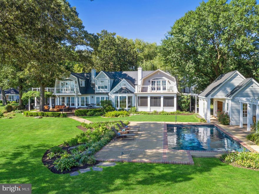 Exquisite waterfront estate with sweeping views of the Severn River from every room.This elegant home boasts: 2 Master Suites, multiple waterside porches, waterfront pool with pool house, guest cottage, 4 car garage. Fine finishes throughout. Waterside privacy on your stunning 1.6 acre lot. Deep water pier. In one of the finest communities on the Severn River w/ easy access to Balt, Wash and BWI.