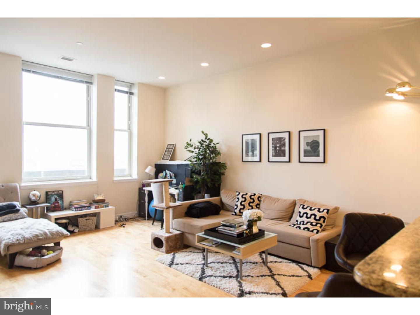 Available late September: Unit #1909 is a spacious 1 bedroom / 1 bathroom condominium in The Phoenix, a luxury high-rise building in the Logan Square section of Center City just a couple blocks west of City Hall and directly across the street from JFK Plaza and Love Park. This unit has beautiful hardwood floors throughout the main living, dining and kitchen area, with well-kept berber carpeting in the bedroom. With high ceilings and huge windows, tons of natural sunlight comes in from the northern exposure in the living room and bedroom. Being on the 19th floor you have views for miles across the city! The kitchen has granite countertops with raised breakfast bar for additional seating options, stainless steel appliances, sleek black wooden cabinetry, deep stainless double sink and a laundry closet with washer/dryer hookups. The bathroom has a large, tiled shower stall with glass enclosure PLUS a separate bathtub, his and hers double sink with granite vanity top, linen closet and modern fixtures. The Phoenix condominium building has Five Star amenities: 24/7 front desk concierge, fitness center, media room with billiards, conference rooms / business center, well kept common areas, and an amazing rooftop terrace with 360 degree unobstructed views of Center City. Off of the lobby is a spa, salon, credit union and Starbucks. PLUS the building has DIRECT ACCESS to Suburban Station ? ideal for commuters, you don?t even have to go outside during bad weather to begin your commute. First month, last month, one month security deposit due at lease signing. $45 application fee per applicant. Tenants responsible for all utilities: water, electricity, cable/internet. Pets are conditional based on owner's approval and will require additional deposit, if accepted. Generally this is $500/dog and $250/cat