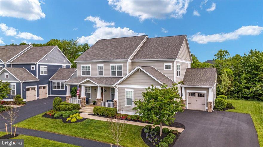 OPEN SUNDAY 12-2 
Welcome to 40793 Foxtail Fields Drive, a charming oasis nestled in the heart of Willowsford, one of Aldie's most coveted communities. This exquisite property seamlessly blends modern luxury with the tranquility of its natural surroundings.

As you arrive, you are greeted by a meticulously landscaped front yard and large front porch that sets the tone for the elegance within. Step inside to discover a thoughtfully designed interior boasting an abundance of natural light, hardwood floors, volume ceilings  and contemporary finishes throughout.

The main level features an expansive open concept living area, perfect for entertaining guests or enjoying cozy evenings by the fireplace. The gourmet kitchen is a chef's delight, equipped with top-of-the-line appliances, sleek quartz countertops, and ample cabinet space.  The kitchen flows seamlessly into the family room and eat in kitchen area and sunroom . Adjacent to the kitchen, the butlers pantry leads into the  formal dining room that offers a sophisticated setting for intimate dinners or festive gatherings.  This level also provides a private office and a bonus room that can be used as an additional main level bedroom, 2nd office or playroom. The 1/2 bath on the main level has room to convert to a full bath if needed.

Upstairs, the luxurious primary suite awaits, complete with a spacious layout, sitting room, a spa-like ensuite bathroom including a huge walk in custom shower, an oversized soaker tub  and a walk-in closet. Three additional bedrooms provide comfort and privacy for family members or guests, each offering its own unique charm. Bedroom 2 has an ensuite full bath  and bedrooms 3 and 4 share a Jack and Jill bath.

The lower level is set up for more entertaining with a functional wet bar, full bath. walk up access to the backyard  and lots of storage. 

Outside, the  backyard offers a great screened in covered porch, ready for a casual meal or beverages.

Conveniently located in Aldie, residents of Foxtail Fields enjoy easy access to a variety of shopping, dining, and entertainment options, as well as top-rated schools and scenic parks. Close to Dulles Airport and major roadways. 

At the heart of Willowsford is a commitment to preserving the natural beauty of the land while providing modern amenities and conveniences for its residents. The community is divided into four distinct villages, each with its own unique character and charm.

Residents of Willowsford enjoy access to an impressive array of amenities, including miles of scenic trails for hiking and biking, state-of-the-art fitness centers,  2 swimming pools perfect for cooling off on hot summer days. The community also features a lake and working farm where residents can participate in hands-on farming activities and enjoy farm-fresh produce through the CSA program.

Community events and social gatherings are a hallmark of life in Willowsford, fostering a strong sense of connection and camaraderie among neighbors. From seasonal festivals and farmers' markets to cooking classes and outdoor concerts, there's always something happening in Willowsford to bring residents together.

Don't miss your chance to own this extraordinary residence in one of Aldie's most coveted neighborhoods. Schedule your private tour of 40793 Foxtail Fields Drive today and experience luxury living at its finest.

Check out the virtual tour for floor plans and walk thru video.