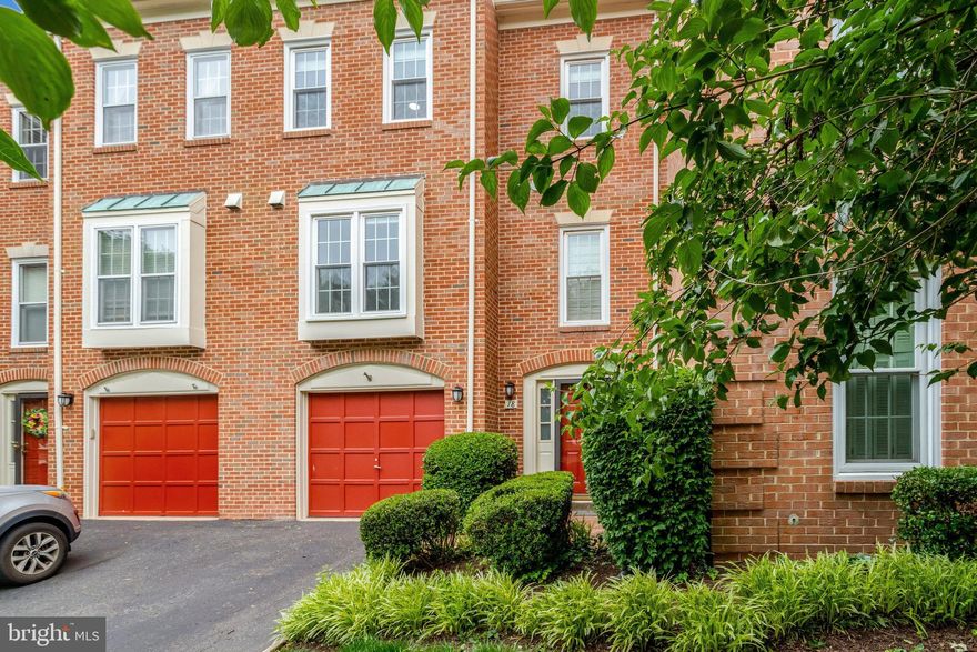 Updated 3-Level Town home in a Prime Arlington Location. Hassle free living, with front yard maintenance included in monthly rent.

Beautifully maintained and filled with natural light, this spacious three-level town home offers modern updates, flexible living spaces, and exceptional convenience. Located near Route 50 with quick access to  I-66, I-495, and the GW Parkway, plus nearby parks, trails, and top-rated Arlington schools.

Entry & Lower Levels
The entry level features an extended 1-car garage with built-in shelving and room for a workbench or extra fridge, along with a large cedar closet and smart security upgrades including a keypad lock, Ring HD doorbell, and garage keypad. The walkout lower level includes a cozy gas fireplace with cinema-style lighting, projector pre-wiring, built-in wine storage, an updated marble sink, renovated half bath, and a spacious walk-in closet. Double sliding doors open to a private brick patio.

Outdoor Space
The generous patio overlooks a wide, HOA-maintained grassy common area—perfect for outdoor enjoyment. A rear garden bed, exterior water hookup, and hardwired Ring floodlight add utility and peace of mind. New exterior HVAC units installed in 2024.

Main Level
The open-concept living and dining area features refinished hardwood floors, a wood-burning fireplace, crown molding, and large windows with views of trees and green space. The refreshed kitchen (2024) offers new cabinetry and backsplash, induction cooktop (2022), Bosch dishwasher (2021), built-in microwave, soft-close drawers, roll-out shelving, and a bright boxed window. A dedicated laundry room with new washer/dryer (2024) completes this level.

Upper Level
The upper level includes three bedrooms and two full bathrooms. The spacious primary suite offers two closets, room for a King-sized bed, and an updated en-suite bath with double vanity, tiled shower, and upgraded lighting. Two additional bedrooms—one large enough for a King—plus a well-appointed hall bath and two linen closets provide comfortable space for family or guests.

Upgrades
Additional highlights include a rare dual-zone HVAC system (2020), sterilized ductwork (2021), cleaned dryer vent (2024), Ecobee smart thermostats with wireless sensors, and Verizon FiOS gigabit availability.

Don't miss this opportunity to call 18 S. Montana Street home!