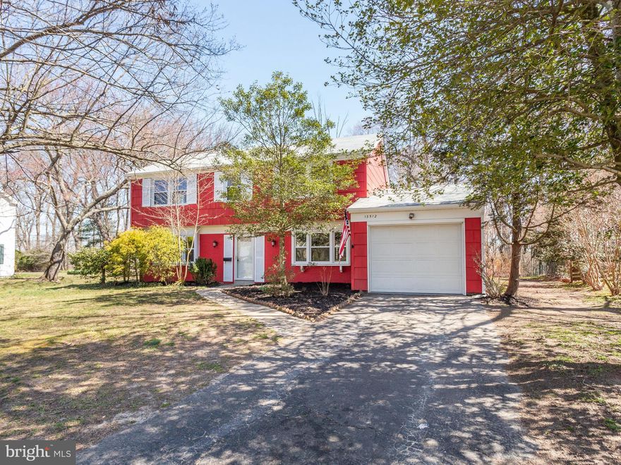 BUYER FINANCING FELL THROUGH - THEIR LOSS, YOUR GAIN!  Will not disappoint   Beautifully updated, pristine condition - spacious two-story colonial,  Perfect for the wildlife and nature enthusiast.  Enjoy the warm weather on your private deck and partially cleared/partially wooded large lot with shed. The details make the difference;  new kitchen, baths, water heater, washer/dryer, interior paint and new carpet/flooring throughout.  Newer roof, hvac, windows & doors. Spacious addition off of kitchen perfect for gatherings or recreational room complete with a wood stove.  Once car garage  - very clean, floor just redone, includes great shelving. Easy access to DC, VA, Baltimore & Annapolis. BWI. Shopping, restaurants, theaters, parks & ball parks close by.