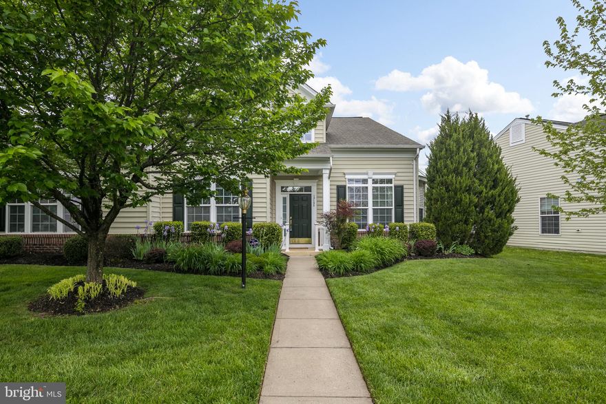 ***THIS IS AN ACTIVE ADULT COMMUNITY (55+)***HOME FEELS LIKE NEW!!  Don't miss out on this rare opportunity to purchase a gorgeous, move-in ready home in the Dunbarton active adult community in Braemar!!  Beautiful open floor plan boasts four bedrooms and three full baths.   Upgrades include newly painted interior throughout and like-new hardwood floors that add warmth and sophistication. Gourmet kitchen has upgraded Corian counters and eat-in area.   The home is loaded with windows allowing ambient light to surround the spacious family room.   Private view of trees out the back windows!   Master bedroom suite, second bedroom and full bath in hallway complete the main level.  The second floor loft makes a perfect game/tv area.  The top level includes two more generously-sized bedrooms and a full bath.   Yard is beautifully landscaped with in-ground sprinkler system.   Covered pack porch and stone patio are perfect for entertaining!  Home located in fantastic location close to shopping, dining, and major roadways! Don't miss out on this one - will go fast!