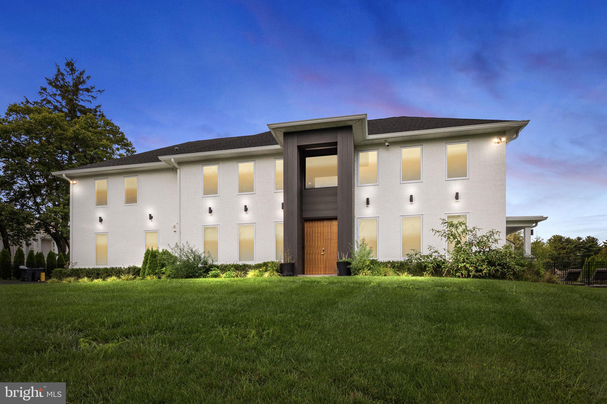 An incredible opportunity to own a - One of a Kind - SLEEK, SEXY, & MODERN home in Lower Moreland has arrived! This beauty is a true dream come true. Complete w polished style, thoughtful design, and so many amenities - this 4 bedroom 4.1 bath home has over 3,500 sq ft & a 2 car garage. No expense was spared in finishing this space full of natural light. 6 foot casement windows, 18 foot ceilings, custom lighting package & trim work throughout. Main level offers a master bedroom or choose the primary master upstairs - both have gorgeous high-end bathrooms. Spend endless nights in the indoor - outdoor space the builder has created - 6 double glass doors open from the 2 story family room to the exquisite covered patio w built in heaters & 2nd outdoor kitchen fully equipped - & lets not forget - the amazing in ground pool w solar cover. Schedule your private tour to see this awesome and you will not be disappointed.