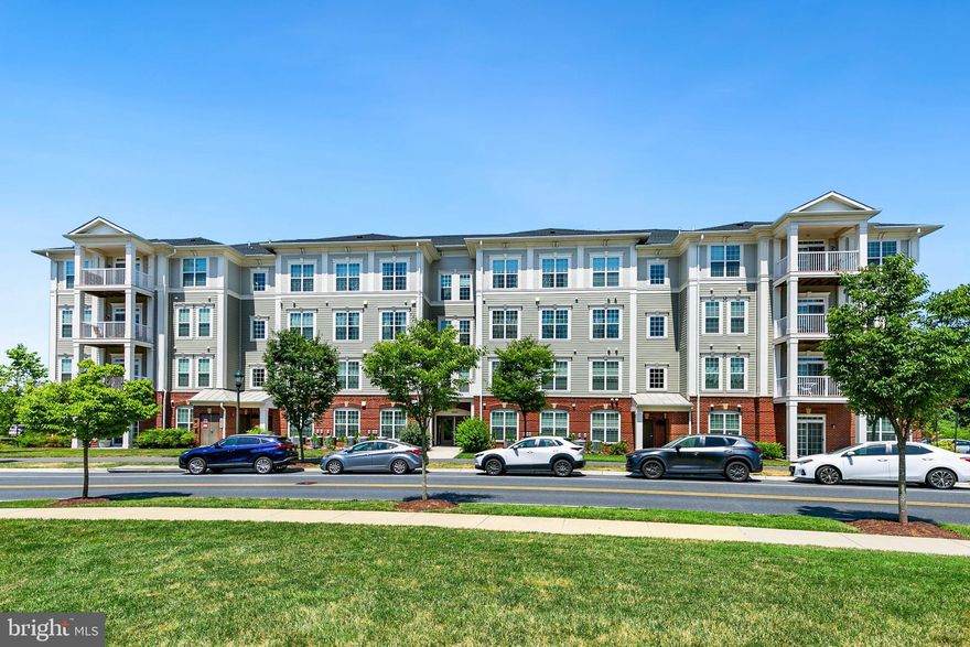 Welcome to 3825 Doc Berlin Drive #23 in the highly sought-after Norbeck Crossing! Built in 2017 and meticulously maintained, this spacious 2-bedroom, 2-bath condo offers luxurious living with over 1,275 sq. ft. of space. As a corner unit, natural light floods the interiors, highlighting the elegant hardwood floors, soaring 9’ ceilings, and modern kitchen that seamlessly flows into the open living and dining areas. The unit boasts a massive terrace, granite countertops, stainless steel appliances, and gas heating and cooking. The primary suite features a walk-in closet and an en suite bath with a walk-in shower. The second bedroom is generously sized, with a large closet and access to a full bath with a tub and shower, which can also be accessed from the hall. For added convenience, the condo includes a  stackable washer and dryer in-unit. The secure building offers a large elevator and wide hallways for easy accessibility.  The low HOA fee covers common area maintenance, trash and snow removal, and water, while common area maintenance, trash and snow removal, and water are included in the monthly Condo fee.. Surrounded by nature, residents can enjoy the nearby walking trails and the beauty of Lake Needwood and Lake Frank. The community also features a playground and a dog park. Located just minutes from the Red Line Metro, public transportation, shopping, and dining, this home provides easy access to Leisure World, Downtown Silver Spring, Rockville Town Center, Rio, the ICC, and I-495. Experience the perfect blend of convenience and lifestyle in this safe and connected community. Don’t miss this opportunity for stress-free, luxurious living!