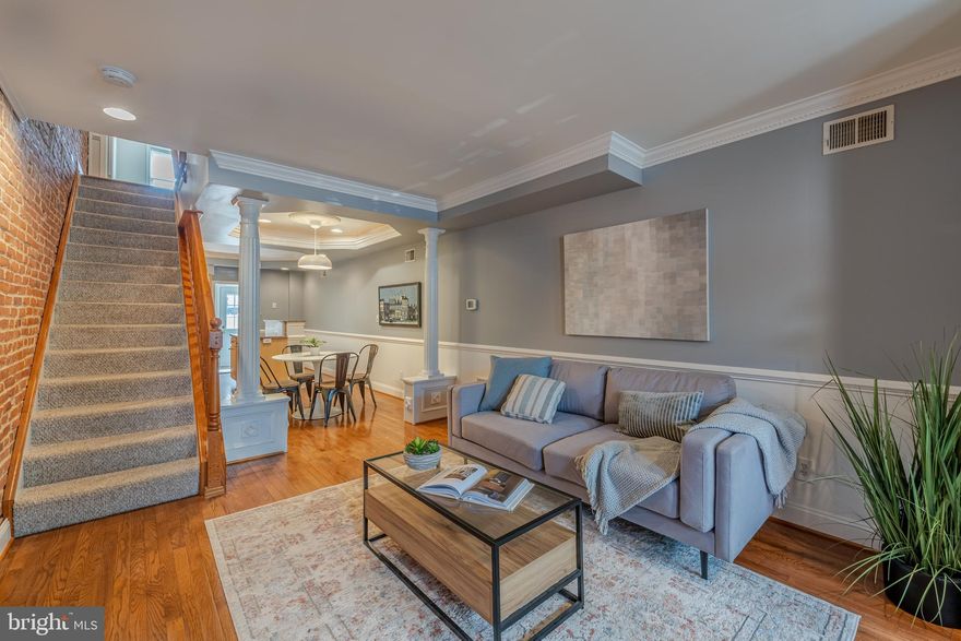 Move right in and embrace a city lifestyle with this well-maintained, two-bedroom, two-and-a-half-bath Canton row home. Be within minutes of area amenities. Hardwood floors throughout, main level half bath, finished lower level flex space, and stunning views from the rooftop deck. Enjoy the fully fenced-in, brick patio space perfect for grilling and entertaining.