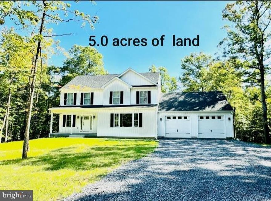 Beautiful Colonial Style Home on 5 Acres
Welcome to 218 Calvius Way, a newly built dwelling nestled on over 5 acres of serene land in Hedgesville, West Virginia. If your seeking seclusion and tranquility, this house is the perfect fit for you!

Key Features:
- Bedrooms: 4
-Bathrooms: 2 full, 1 half
-Finished living space: 2,300
-Lot size: 5.0 Acres
-Year Built: 2023

Interior Highlights:
-Dual Heating and air
- Spacious Kitchen 20' x 20' eat-in kitchen with grey cabinets, granite countertops, large pantry and stainless-steel appliances
-Luxurious vinyl plank flooring throughout the entire main floor
-office with barndoors and huge mudroom
-Cozy living room with shiplap 

Exterior Features:
-Inviting front porch for summer evenings
-Sizeable back deck to enjoy nature's beauty
-common areas with pond, gazebo, and picnic table

Location:
- Just 30 Minutes from Martinsburg
- 20 Minutes to Inwood
-35 Minutes to Winchester (Va state line)
-Conv located about 15 minutes from Sleepy Creek State Forest which offers 
(hiking, hunting, fishing and camping)

Don't miss out on this gem! Contact us today before this home is gone!