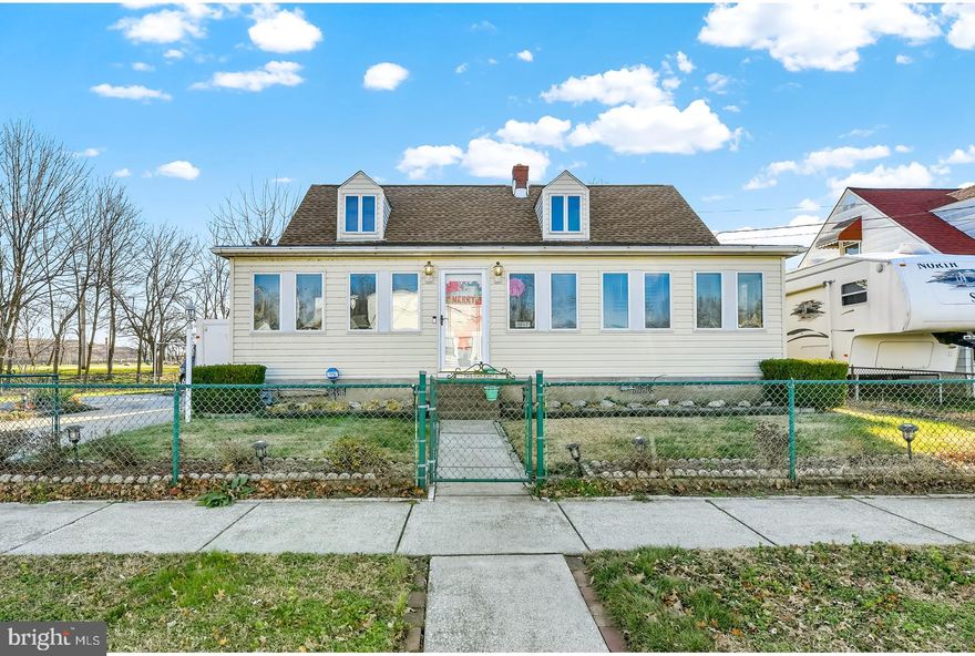 Welcome home to this fabulous Waterfront sitting on  .72+ acres. Fully fenced yard with huge driveway and 3 parking pads. Detached 1 car garage in rear and 2 storage sheds. Huge back yard leading to your 100 ft pier  with electric and sandy beach. Front entrance has spacious foyer and office. This home offers 4 bedrooms and 2 full baths. Huge kitchen has lots of cabinet space that opens to sun filled dining area. Detailed craftsmanship through-out and 5 skylights.  Main level has 2 bedrooms, full bath and nice size family room with skylights Upper level has 2 bedrooms and full bath.  Rear bedroom has deck overlooking waterfront.