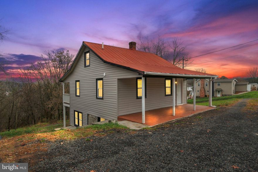 Welcome to this beautifully updated home in the picturesque town of Hancock! This property has been fully renovated, inspected, and permitted by the city, ensuring it’s move-in ready for its new owner.  

Nestled on a gentle slope, the home boasts its own private driveway and a generous expanse of land in front, offering both privacy and scenic views.  

The main floor features a spacious layout with a large full bathroom, a comfortable bedroom, and a cozy living room situated next to the updated kitchen. From the living room, step out onto a spacious covered deck, perfect for relaxing or entertaining, with stairs leading down to the lower level.  

The basement, which serves as the first floor, offers a full walk-out design with plenty of windows, flooding the space with natural light. This level includes a convenient laundry area and offers endless possibilities for additional living or storage space.  

This home is equipped with modern upgrades throughout, including:  
- Brand-new heat pump for efficient climate control.  
- All-new windows for energy efficiency.  
- Brand-new appliances for a worry-free start.  
- Completely updated interiors – new everything!  

Enjoy easy access to major highways I-70 and I-68, making commuting a breeze. The location is ideal for outdoor enthusiasts, being close to a lake with fishing opportunities, camping areas, and even a nearby casino resort for entertainment.  

This home has it all—modern comforts, a fantastic location, and endless charm. Just bring your belongings and start enjoying this lovely property!  

Don’t miss this opportunity to own a beautifully updated home in Hancock. Schedule your showing today!