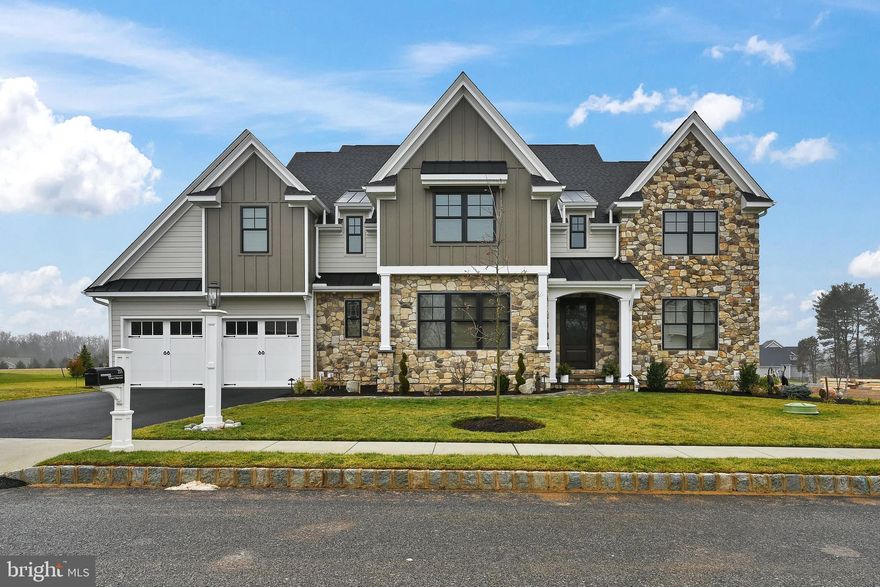 A rare opportunity awaits in the award-winning community of Troutbeck Farm, Malvern's finest neighborhood by local and semi-custom builder Moser Homes, without the wait for a new build. With a team consisting of renowned architect McIntyre Capron designing the floor plan, Moser Homes constructing a quality home with unmatched luxury combined with the Seller's keen eye for timeless finishes, you can buy with confidence. Located within the highly-acclaimed Great Valley SD in bucolic Willistown, you are just minutes from downtown Malvern Borough. Combined with refined living in a community oriented setting with open space and walking trails, you will easily fall in love with this location. Currently, there is an (approx) 1 year wait for a new build in Troutbeck; trade in the wait time for a turn-key home & begin unpacking in the Spring! At just 1-Year Young, this 4BR, 3 Full/2 Half Bath "Warren" Model w/ Finished Basement and an abundance of additional upgrades completed by the owner (see document section for a detailed list of all features by Moser as well as post-settlement improvements) includes a Chef's Kitchen with 11x4' quartz island, a Mud Room with Closets and "Cubbies", Main Floor Office, Main Bedroom Suite complete with Two Custom WIC and an Ensuite Bathroom, a spacious 2nd floor Laundry Room - all on a premium corner lot with a 2-car garage with custom organization system. This home is the perfect marriage of elegance and comfort, boasting 10' ceilings on the main floor and in the basement, a 2-story foyer with stunning chandelier and floor to ceiling trim and millwork that carries your eye up the beautiful turned stairwell tower. Easy to maintain engineered wood plank flooring flows throughout the first level, as does detailed woodwork, two-piece crown molding and recessed lighting. The formal LR offers a quiet space in the corner of the home to sit & relax. The formal DR offers beautiful wall wainscot, large windows, a tasteful gold chandelier & a convenient entry to the kitchen through the adjacent Butler's pantry. The 24x20 family room is the heart of the home, featuring a gas double-sided fireplace with a mantle and custom built-ins, creating a cozy and inviting atmosphere. The kitchen, the sunny "morning" room for informal dining, and the family room flow together nicely for everyday living and entertaining guests. The kitchen has been upgraded extensively to feature a top of the line appliance package (Wolf wall oven, microwave & 6-burner gas cooktop, Cove DW, Thermador Ref. & U-Line Beverage Cooler Drawers), 42" cabinetry with additional glass front cabinets with accent lighting, and a box ceiling with shiplap detail. There is a 16x12 office on this level- work next to the warmth of a fire or open the blinds & walk outside sliding doors to your sun-drenched deck to recharge. An additional hall WIC with added electrical outlet completes this 2,170sf level. As you walk up the stairs, the millwork, light fixtures and the 13x-11 loft-style landing that overlooks the foyer at the top of the steps will take your breath away. Double solid wood doors lead to the master suite of your dreams w/an ensuite bath feels more like a spa, w/spacious vanity top w/ dual sinks + seating. There is a linen closet & water closet & shower w/rainfall shower head, bench seat, herringbone tiled niche, & a tiled area outside of the shower that is the perfect space for a bench to dry off. The dual WICs both are outfitted with custom organization systems for ALL of your clothing & shoes. Two bedrooms, both with shiplap accent walls & large closets share a Jack & Jill bathroom. The 4th BR has an ensuite bathroom AND a WIC. The basement is an entertainer's dream with a 2-tiered bar, large gathering area, a "movie corner" w/ built-in wall speakers, powder rm and storage rm. An Azek deck extends the living space. This home is a true must-see. NOTE:Seller did 500k+ upgrades with Moser and approx. 125k in post-settlement improvements.