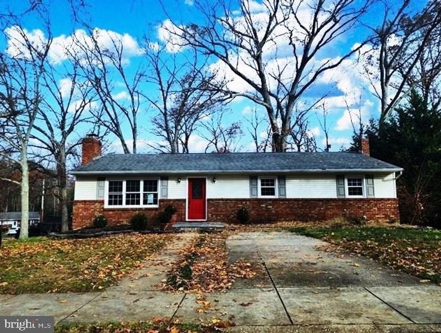 Charming 3-bedroom, 2.5-bathroom rambler located in a water-access community. This home features beautiful hardwood floors, modern stainless steel appliances, granite countertops, a stylish subway tile backsplash, renovated bathrooms, and a fully finished lower level with a cozy fireplace and an additional half bathroom. Enjoy outdoor living with a spacious deck and a large backyard. This property combines comfort and style in a desirable neighborhood with water access.