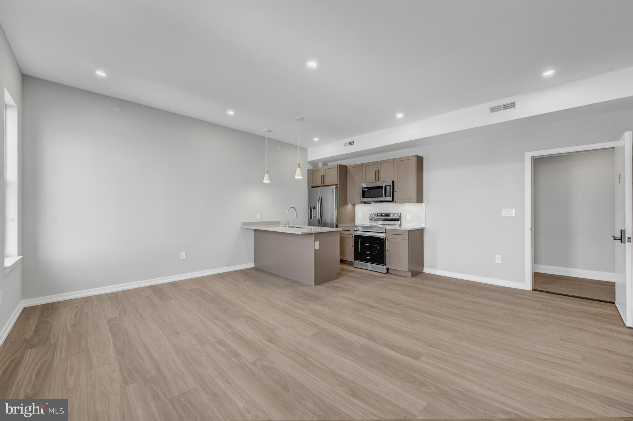 Welcome to Innovator Village, nestled in the heart of Graduate Hospital! This gated community is home to 82 brand newer construction, luxury units featuring top of the line finishes. 2445 Innovator Way offers everything you could desire in a city apartment and can be moved into immediately. This 775 SF unit features a spacious, open living room with huge windows and lovely natural light, a kitchen with quartz countertops and stainless steel appliances, a beautiful bathroom, hardwood floors and an in unit washer/dryer. The building features a shared roof deck with beautiful views of Center City. Innovator Village is located on the bustling Washington Ave corridor with easy access to Drexel University, CHOP, Penn University, I76, restaurants, shops, public transportation and much more! On site parking is available for lease for $300/month (currently all rented but availability likely coming this summer).