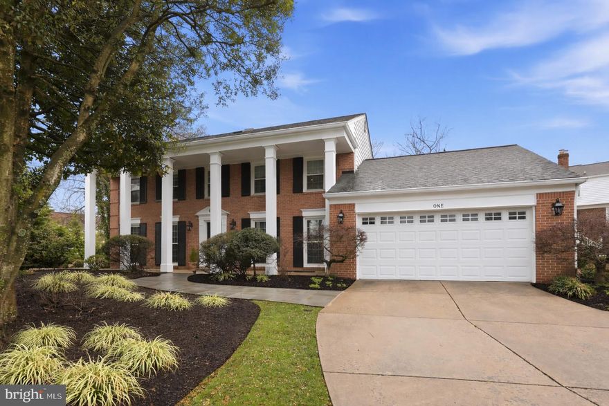 NEW ON MARKET! 1ST OPEN Saturday, 3/21 & Sunday, 3/22 from 1-4PM. Welcome to this impressive all-brick home, perfectly situated at the end of a quiet cul-de-sac, offering a rare combination of architectural grandeur and meticulous modern updates. As you enter, you are greeted by a breathtaking two-story foyer illuminated by a soaring ceiling with skylight and featuring a stunning circular staircase. The main level flows effortlessly, offering a private first-floor library, sizable living and dining rooms and a family room centered around a custom stone-surround gas fireplace. The true heart of the home is the spectacular 25-foot kitchen expansion and solarium complete with architectural beams, walls of glass, and a gourmet 2023 refresh featuring Calacatta Quartz countertops, a matching backsplash, and premium cabinet hardware.
The interior showcases a commitment to quality, with recessed lighting,  gleaming hardwood flooring that was extended throughout the entire home and across the spiral staircase. Upstairs, you will find four generously sized bedrooms, including a luxurious primary suite remodeled in 2018 with updated bathroom and a custom walk-in closet featuring high-end wood shelving. Every bedroom in the home is equipped with a professional closet system, and every window has been replaced and adorned with high end custom window treatments. For additional living space, the lower level has been finished with new flooring and ample storage, complemented by a convenient half-bath.
Outdoor living is equally impressive, featuring a premium flagstone patio and covered porch installed in 2020, a matching flagstone front walkway, and a private basketball/sport court set within a large side yard. Beyond the aesthetics, this home offers exceptional peace of mind with mechanical upgrades, including a new HVAC system (2023) and a professional moisture barrier and dehumidifier in the lower level crawl space (2025). From the dramatic foyer to the sun-drenched solarium, every inch of this home has been thoughtfully curated for a lifestyle of comfort and sophistication. Located within a top rated school district and just minutes to parks, restaurants, shopping and major commuter routes, this exceptional home is a true show stopper.