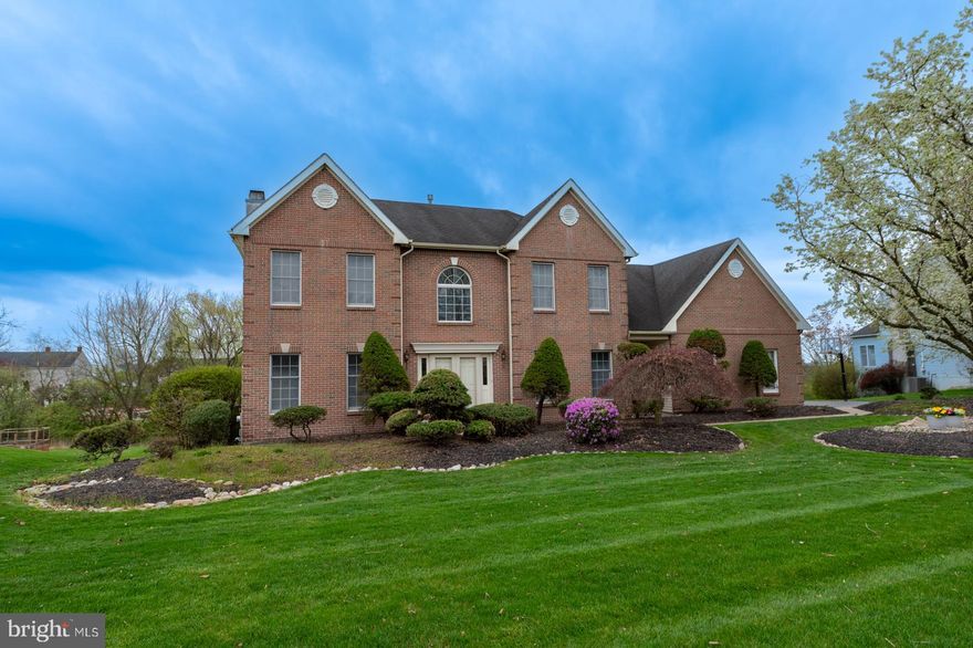 Welcome to 518 Carriage House Lane!  A Toll Brothers build with a full brick front located in the highly desirable community of Mainland Ridge.   Surrounded by mature trees and landscaping.  Discover the perfect blend of convenience and luxury in this original four bedroom,  two and 1/2  bath home.   Step inside this Canterbury  Federal Grand model to find a spacious layout designed for both relaxation and entertainment.    The sunlit two story foyer has hardwood floors, extensive triple crown and dental molding.   The formal living and dining rooms have chair rail & crown molding and are great areas for hosting large gatherings.   Down the hall is a convenient powder room and double coat closet.   Around the corner is the spacious sunny kitchen with plenty of cabinet space.   The 42" cabinets are a neutral color with new handles.    Plenty of counter space for meal preparation as well as a separate island for casual seating.  The gas stove and built-in microwave are new (2024). The breakfast nook is spacious enough for an eat-in table.   Another feature in this great kitchen is the built in desk.  The kitchen sliding door is new (2024).    Enjoy your morning coffee on the newer trex deck (2022).    Off the kitchen is the expanded family room .  Seasonal enjoyment & comfort in this home! 
 Enjoy the  warmth of the wood burning brick fireplace on those chilly fall/winter days.  Enjoy the beautiful large picturesque  windows  boasting great views into the serene backyard on spring & summer days.  
The 1st floor laundry room is located off the kitchen with  additional access to the  deck.  
(Please note the first and second floors have been freshly painted throughout). 
The three car garage has inside access to a small hallway that leads to a bonus/study room and the laundry room.  A perfect spot to leave your outdoor shoes or school backpacks.
Head upstairs where there are  four generously sized bedrooms.   The  Owner's Suite has a spacious full bath, soaking tub & separate shower.  A sitting room with a spacious walk in closet and views of the wooded back.  The sitting room space can be an additional home office if needed.  (Please note the primary bedroom  has been virtually staged to show it's full potential).  Down the hall are  three additional bedrooms that offer ample closet space and a full hall bath.  A linen closet outside the bedrooms as well.   The full sized unfinished, walkout basement is DRY & just waiting for the new homeowners to make it their own!  The HVAC and humidifier was replaced in (2021). There is also water softener installed in the home.  Walk out through the new sliding glass door (2024) onto a new concrete  patio.  There is plenty of storage room in this house, not to mention the large backyard.  Definitely room for a pool!  The close proximity to school, shopping & the turnpike for your easy commute.   If you are a golfer; just minutes to the lovely Mainland Golf Course. 
Every buyer's dream to live in this prestigious community!  Make your appointment or offer today!!
(PLEASE NOTE - home square footage is between 3000-3500).