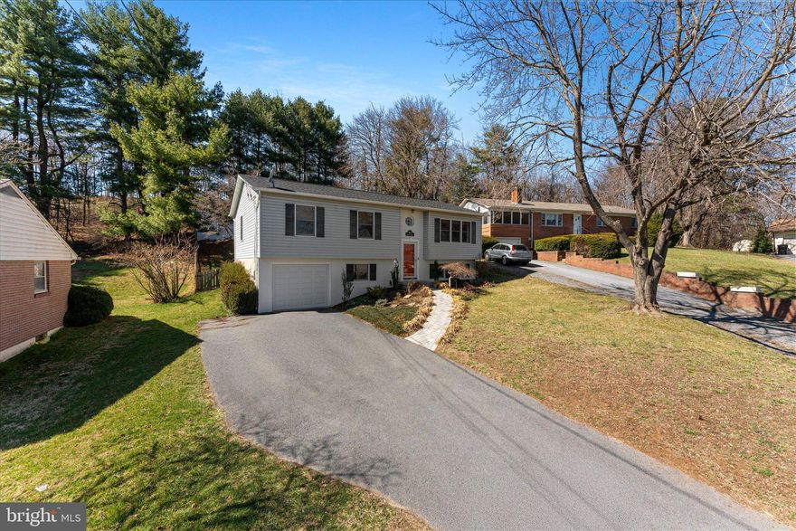 Step into elegance as you enter this remarkable 3BR 2.5 BA single family home on a quiet street in Winchester. Every inch has been thoughtfully designed, brimming with upgrades and impeccable taste. Highlights include contemporary lighting fixtures, a dream-worthy kitchen complete with beautiful stainless steel appliances including a new stove in 2023, granite countertops, shaker cabinets, and an eye-catching backsplash. The main level boasts stunning hardwood floors, while all bathrooms have been beautifully updated. The primary bathroom is a retreat of its own, featuring ceramic flooring, a tiled shower, and a luxurious 6-jet shower panel. Updates include roof (2020), hot water heater (2020), updated primary bathroom, updated AC/heating system, gorgeous landscaping, and a partially covered deck with custom railings add to this home's appeal. Conveniently located just minutes from a hospital, walking and biking trails, grocery stores, shopping, and historic downtown Winchester, with easy access to Routes 50, 37, and 81. Don’t wait; this gem won’t be on the market for long!