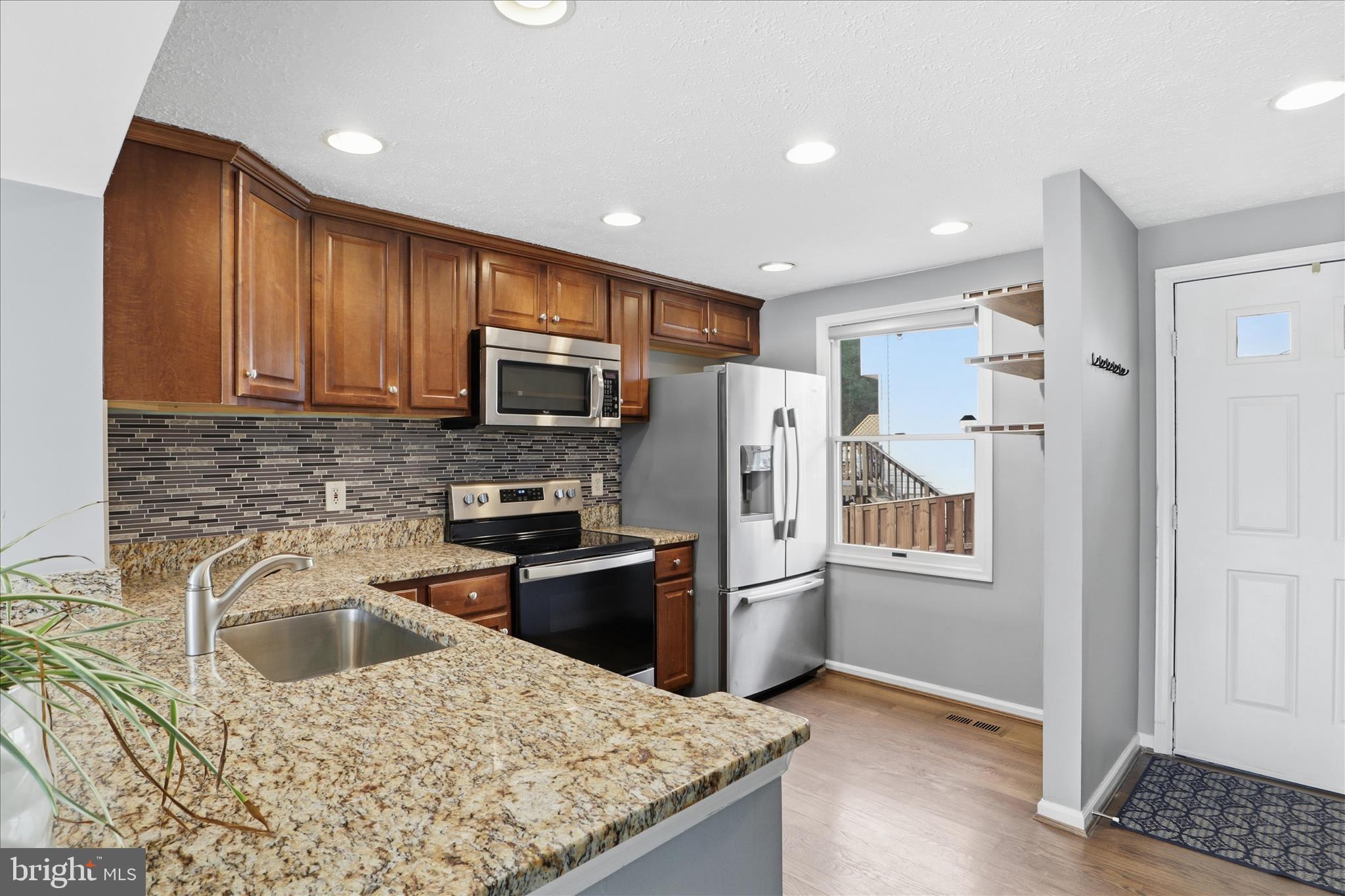 8418 WHITE FEATHER COURT