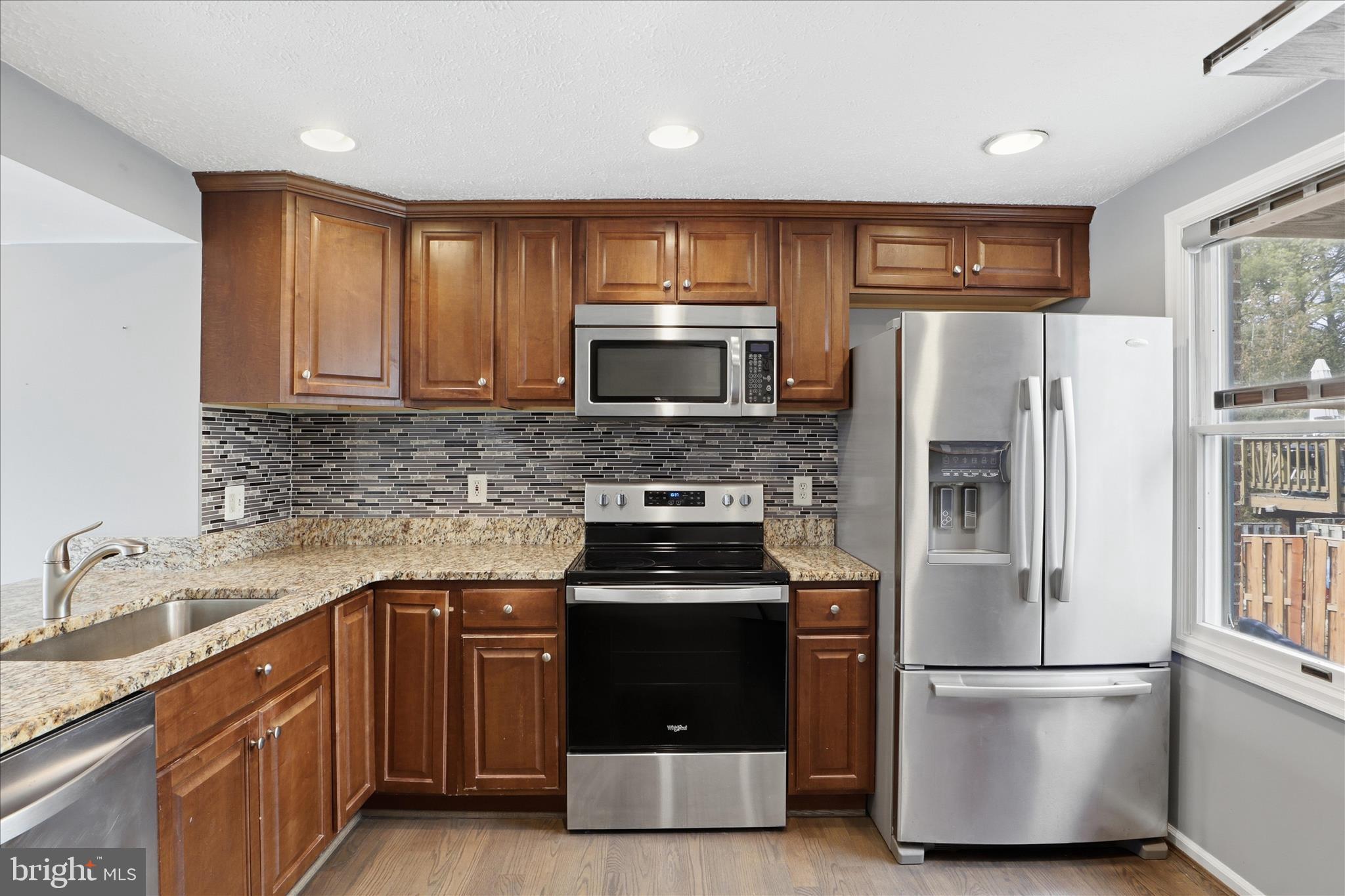 8418 WHITE FEATHER COURT