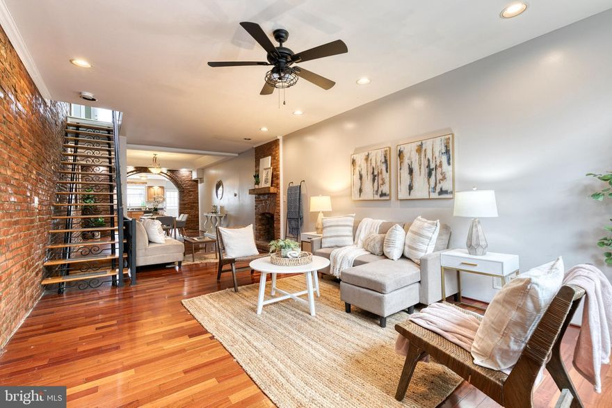 Exceptional Properties. Exceptional Clients. Highlandtown row home with 2 Beds, 1.5 Baths and a detached garage! With over 1400 sq ft of above ground square footage, the main level is wider than most in the area allowing for a large living room and dining room w/ an exposed brick wall, and a decorative fireplace. The Upper Level has 2 Bedrooms, 1 Full Bath, and access to the back deck.  The basement is finished and features, new carpeting, a half bath and laundry room. Out back you have a fully enclosed patio that leads to your detached garage. The back alley way is wide enough to park in the garage, a feature that is hard to find in Baltimore!