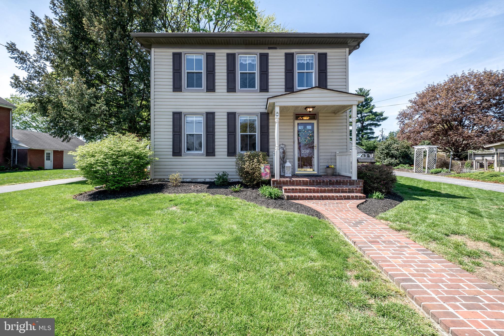 This beautifully maintained home, built in 1920, is nestled on 0.29 acres of land in the Elizabethtown School District. From the moment you arrive, the classic charm of the brick walkway and inviting curb appeal set the tone for this warm, welcoming property. Inside, you’ll find a perfect blend of traditional character and thoughtful updates.
The living room features warm hardwood floors, broad windows, and a cozy propane stove that lends both charm and warmth to the space. The updated kitchen offers stainless steel appliances, a convenient breakfast counter, and ambient lighting. The dining room features a stunning light fixture, floods of natural light, and more hardwood floors. A full bathroom sits just off the kitchen for added practicality, and around the corner is a convenient laundry area.
From the kitchen, the spacious family room welcomes you with a vaulted ceiling and plush carpet, creating an airy yet cozy space for relaxing or entertaining.
Upstairs, you’ll find new carpet in the hallway and primary bedroom. Each of the 3 bedrooms is bright and airy, with large windows and closet space. The upstairs bathroom is spacious and stylish, featuring a tiled floor and modern floating shelves for a clean, contemporary feel.
Step outside to enjoy a backyard made for gathering. The composite deck offers plenty of space for grilling out and eating al fresco, or kick back by the built-in firepit on those cool evenings. An attached one-car garage adds storage and parking convenience, while the large yard offers plenty of room for gardening, pets, or play.
Whether you’re sipping coffee on the back deck, relaxing inside, or enjoying the peaceful setting, this home delivers comfort, style, and functionality at every turn. Don’t miss your chance to make this beautifully updated Bainbridge gem yours.