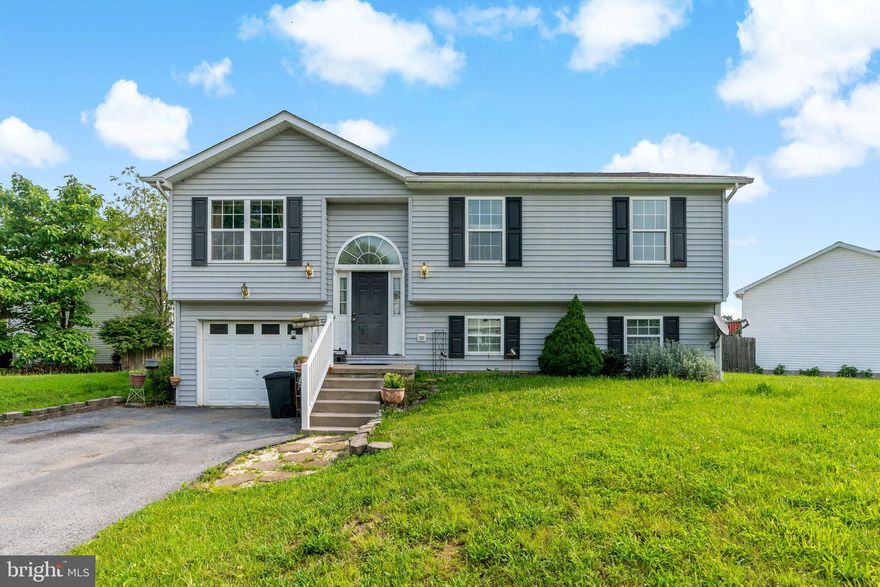 3 bedroom, 2 full bath home located in SPRING HILL subdivision. Three bedrooms/ two full baths on the upper level and a large living area/ laundry room on the lower level. Great starter home or investment property.  Enjoy the deck off the Kitchen with connecting stairs to back yard, and one car garage. Completely fenced in backyard. With easy access to Routes 51 and 11, as well as I-81, this home offers a convenient commute to work and the new stores coming to Inwood. Schedule your showing today!