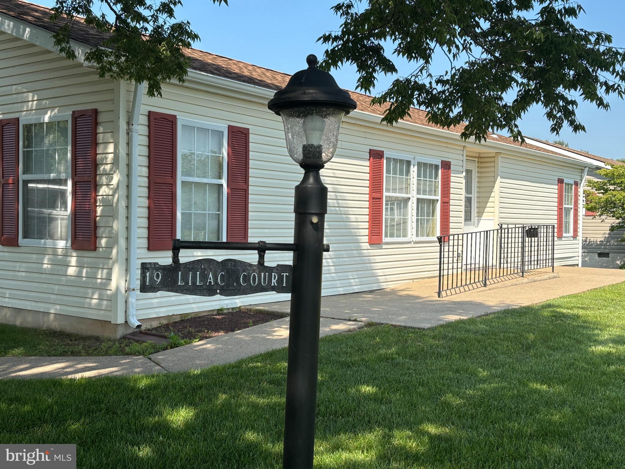 PRICED RIGHT TO SELL, this corner 2-bedroom, 2-bathroom home is now available for sale in the 55+ community of the Village of Buckingham Springs. The home features a brand-new shed for all your storage needs and a front patio, perfect for entertaining or chatting with passing neighbors. With minimal landscaping required, the home also offers parking for two cars.
Inside, you will find a carpeted formal living room and dining room area, along with a fully equipped kitchen to your left. To your right is a spacious family room filled with sunlight. Nearby is the guest bedroom, which can also double as an office or hobby room. The guest bathroom includes a vanity with storage and a shower over the tub. Just off the living room is the primary bedroom that offers a huge ensuite bath that includes a vanity, plenty of closet and storage space, and a shower stall. Some furniture is negotiable. Look at this reasonably priced home and make it your own!