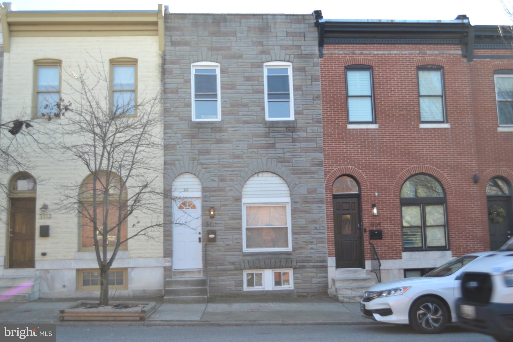 Welcome to this stunning brick-front row home nestled in the heart of the city, perfect for entertaining! 4-Bedroom, 2-Bathrooms and 2 kitchens.
Step through the door to find a natural light split up down 2 apartments. rental income opportunity! including a primary suite with a private balcony
The kitchen is 42-inch white cabinets, granite countertops, stainless steel appliances.
Upstairs, you will find 3 spacious bedrooms, kitchen and 1 full bath. There is off street parking.