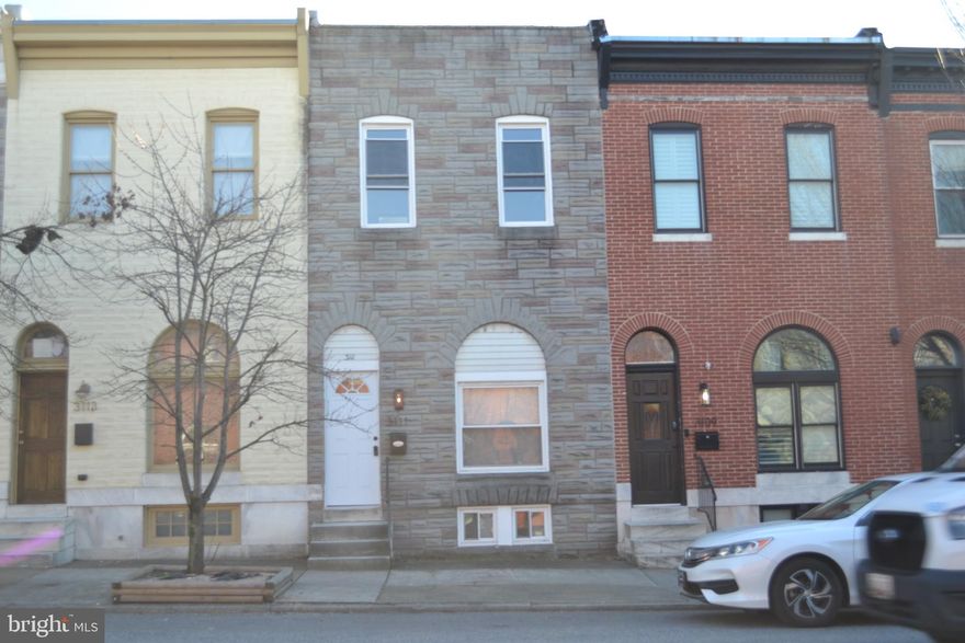 Welcome to this stunning brick-front row home nestled in the heart of the city, perfect for entertaining! 4-Bedroom, 2-Bathrooms and 2 kitchens. 

 Step through the door to find a natural light split up down 2 apartments. rental income opportunity! including a primary suite with a private balcony 
The kitchen is 42-inch white cabinets, granite countertops, stainless steel appliances. 
Upstairs, you will find 3 spacious bedrooms, kitchen and 1 full bath.  There is off street parking.